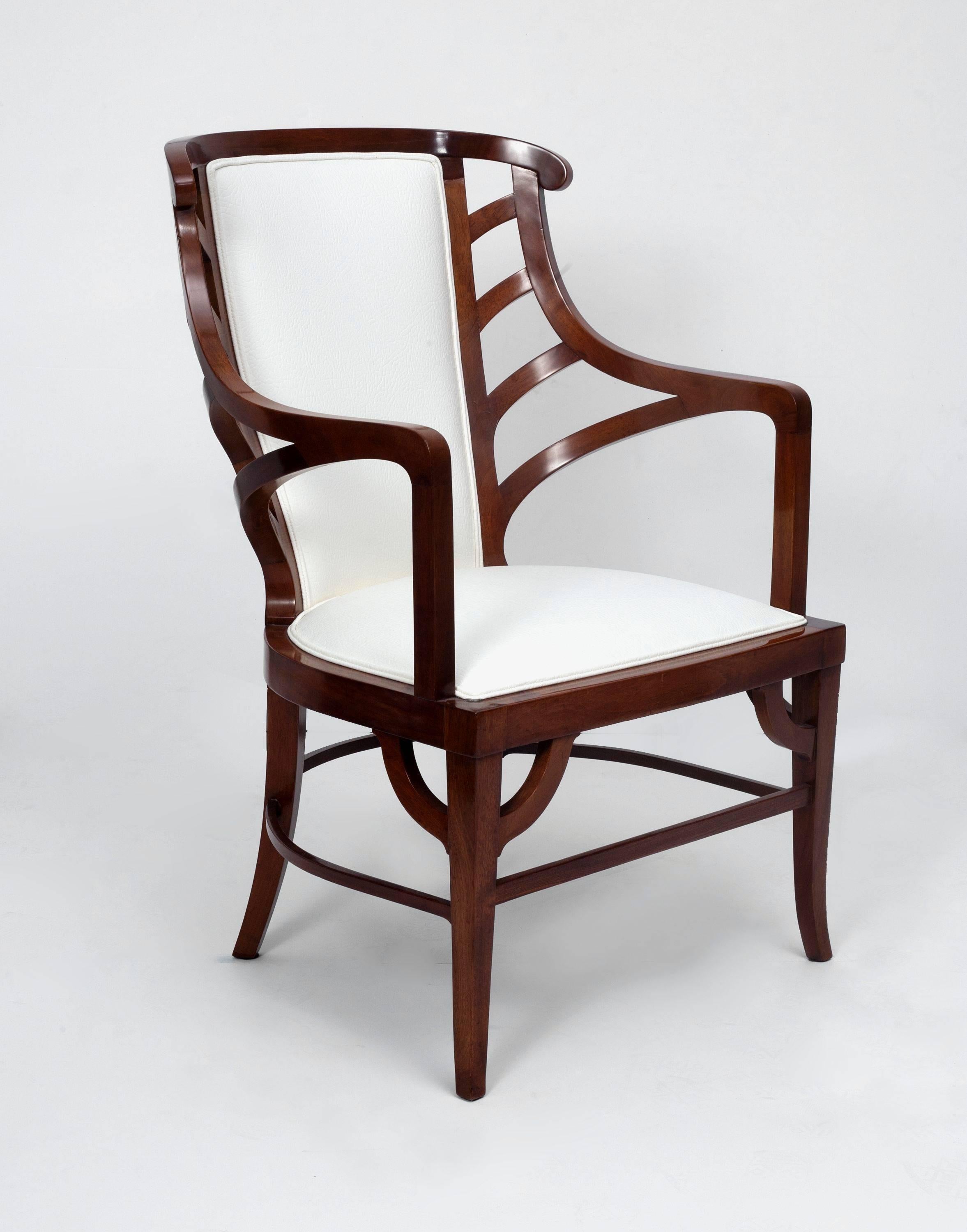 Art Nouveau armchair in walnut and white leather, in the manner of Henri van de Velde.