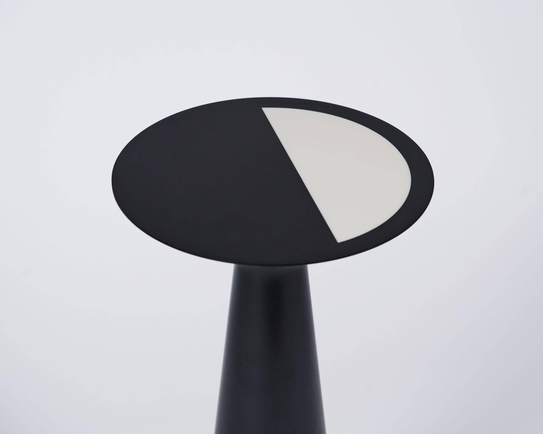 Sandra Nunnerley designed this chic and versatile table in Corian, exclusively for Maison Gerard
Pictured here with two other models from the collection.