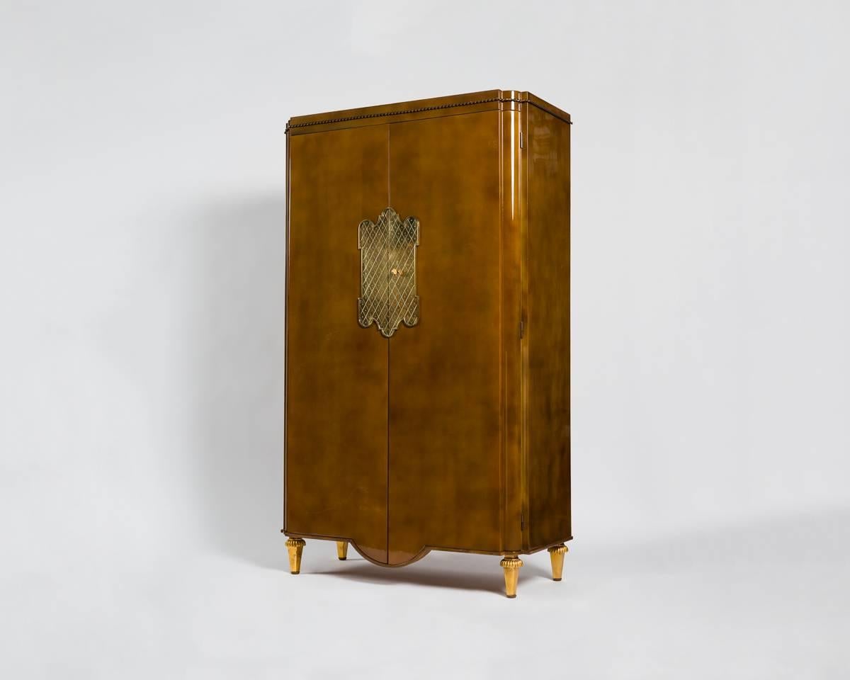 Lacquered armoire by André Arbus with lock and gilt bronze hardware by Gilbert Poillerat.
Documented in: Yvonne Brunhammer André Arbus, éditions Norma, Paris, 1996, p. 8.