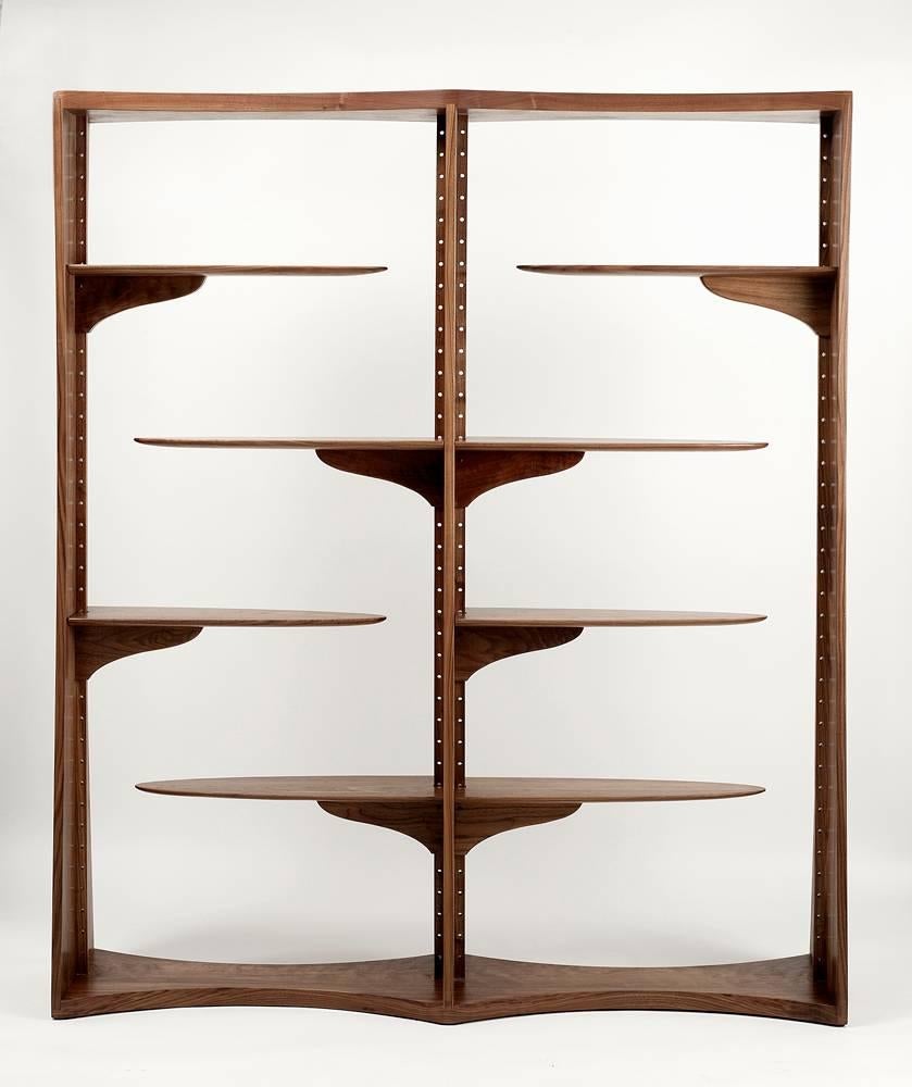 A black walnut etagere with four adjustable shelves, finished to a satin sheen. First created in Massachusetts by master craftsman Michael Coffey, and fabricated by the artist in 2016. 

Finish: Waterlox original tung oil, satin sheen.