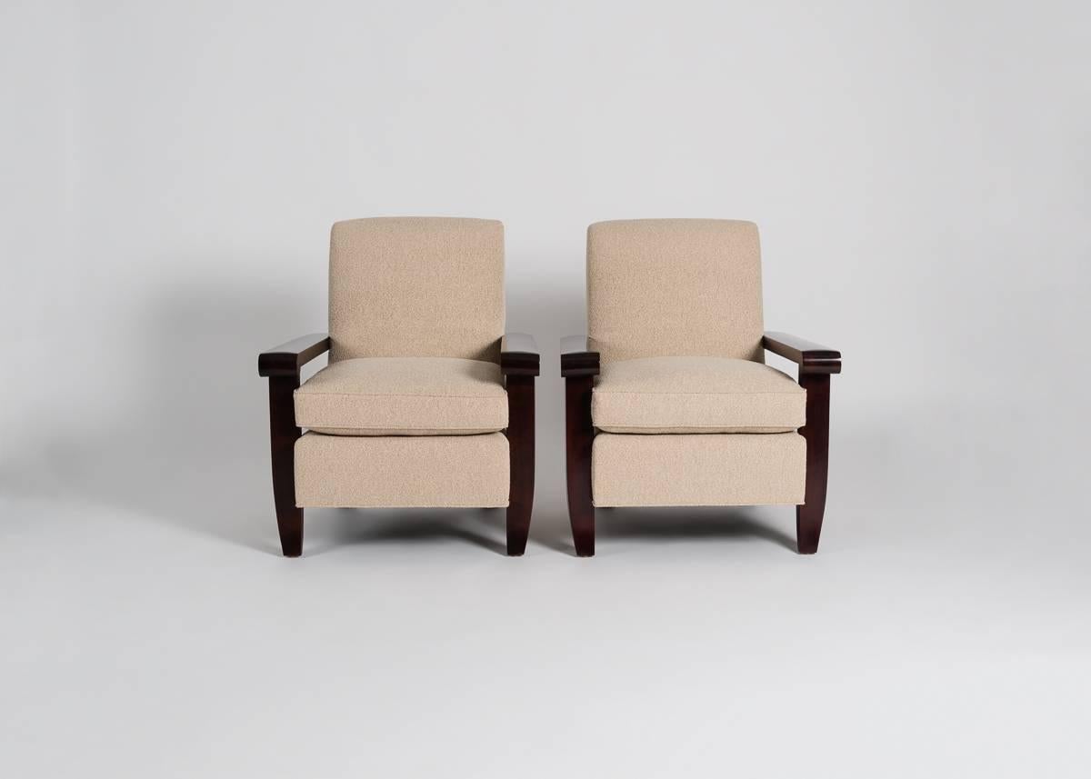 This pair of armchairs was commissioned for the Palais des Consuls de Rouen in 1955 as part of a joint project with fellow designer André Arbus. The pieces possess the weight and balance of Arbus's neoclassically inspired work, but like much of