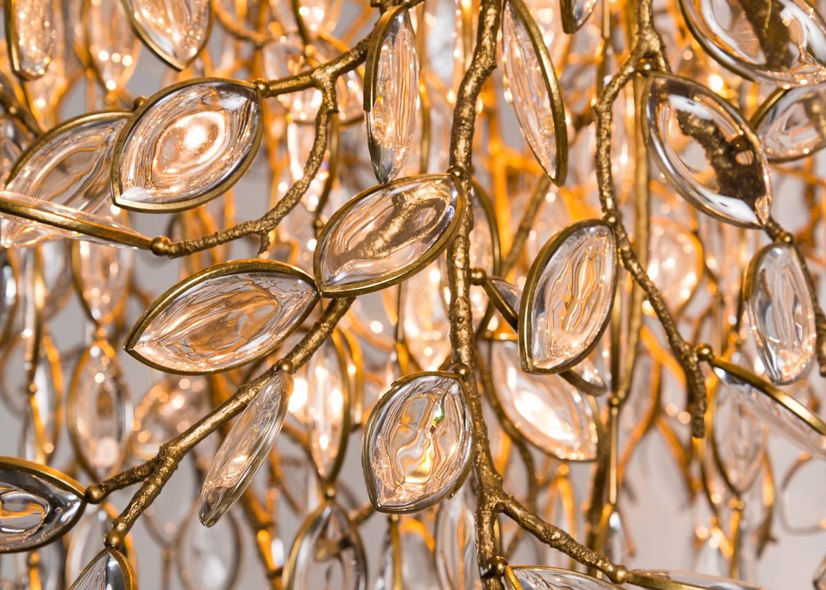 Washington based designer Thomas Pheasant's chandelier, is a beautiful piece of hanging crystal and cast bronze, arranged to appear like a shimmering willow tree. 

Limited edition of seven.
    