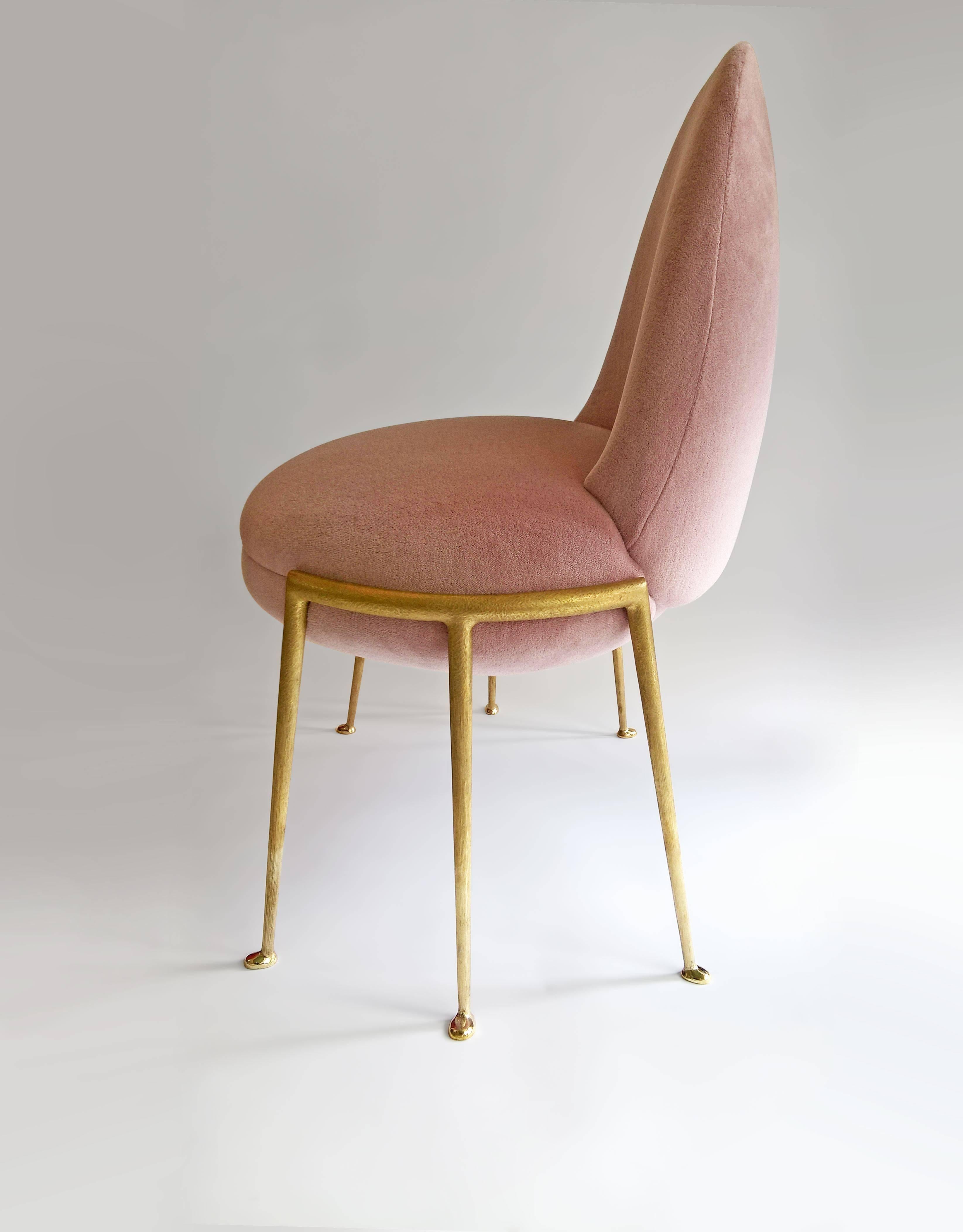 Papillia, a fanciful new side chair from Achille Salvagni, has six bronze legs, an extra-wide seat and an elegantly parabolic back.

Limited edition of 48 + AP.
