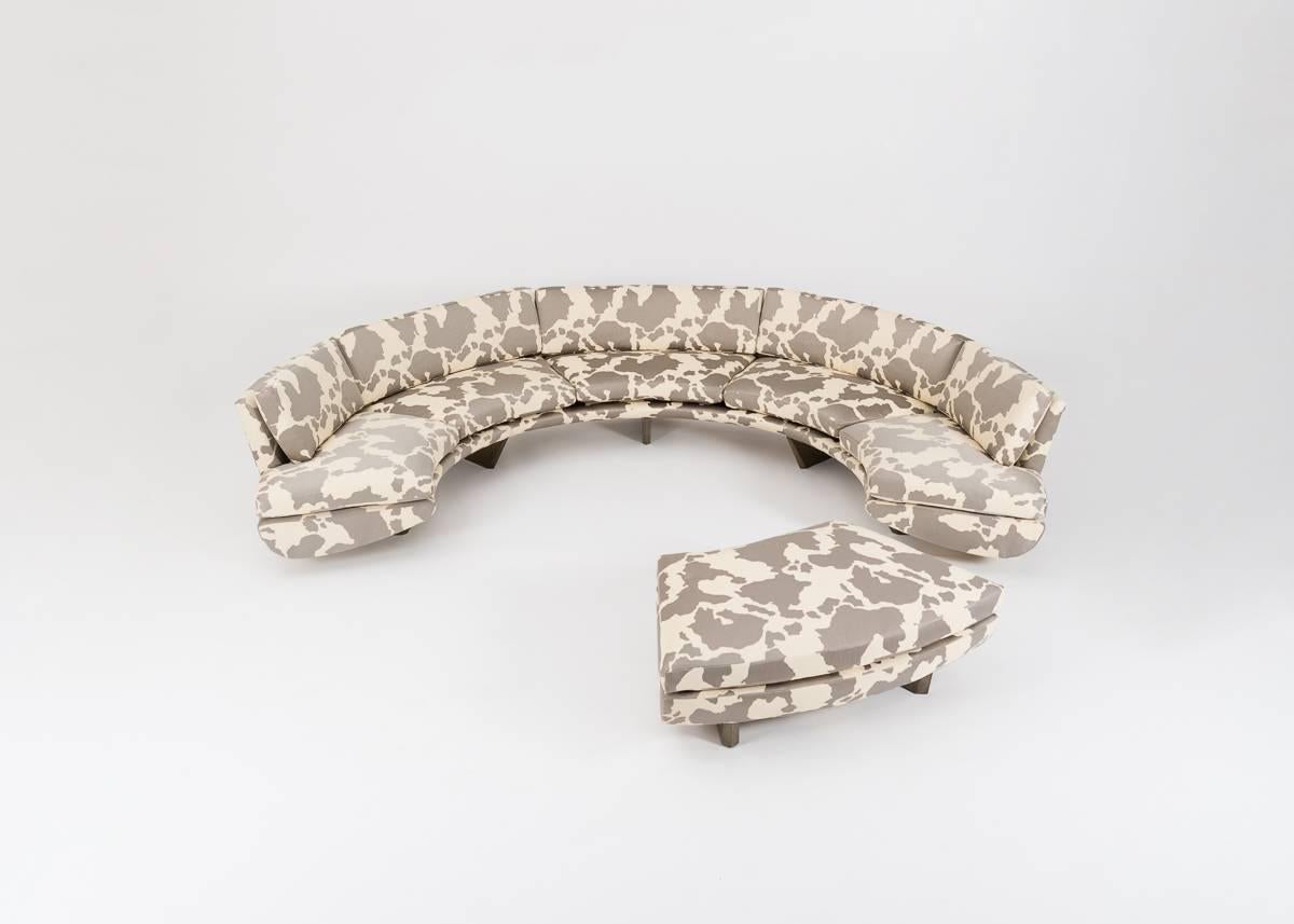 This monumental edition of the Whalebone series curves into a symmetrical semicircle of more than 180 degrees. The sofa's legs, which provide the piece's strong skeleton and, placed as they are, resemble a whale's vertebrae, are in this edition