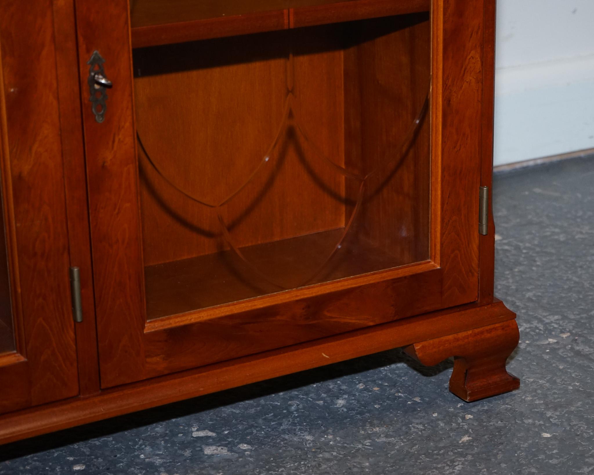 Hardwood VINTAGE YEW WOOD GLAZED BOOKCASE SIDEBOARD TRIPLE DOOR DISPLAY CABiNET For Sale