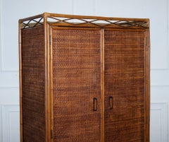 VINTAGE RATTAN AND CANE TWO DOOR AMOIRE OR WARDROBE WiTH ONE DRAWER