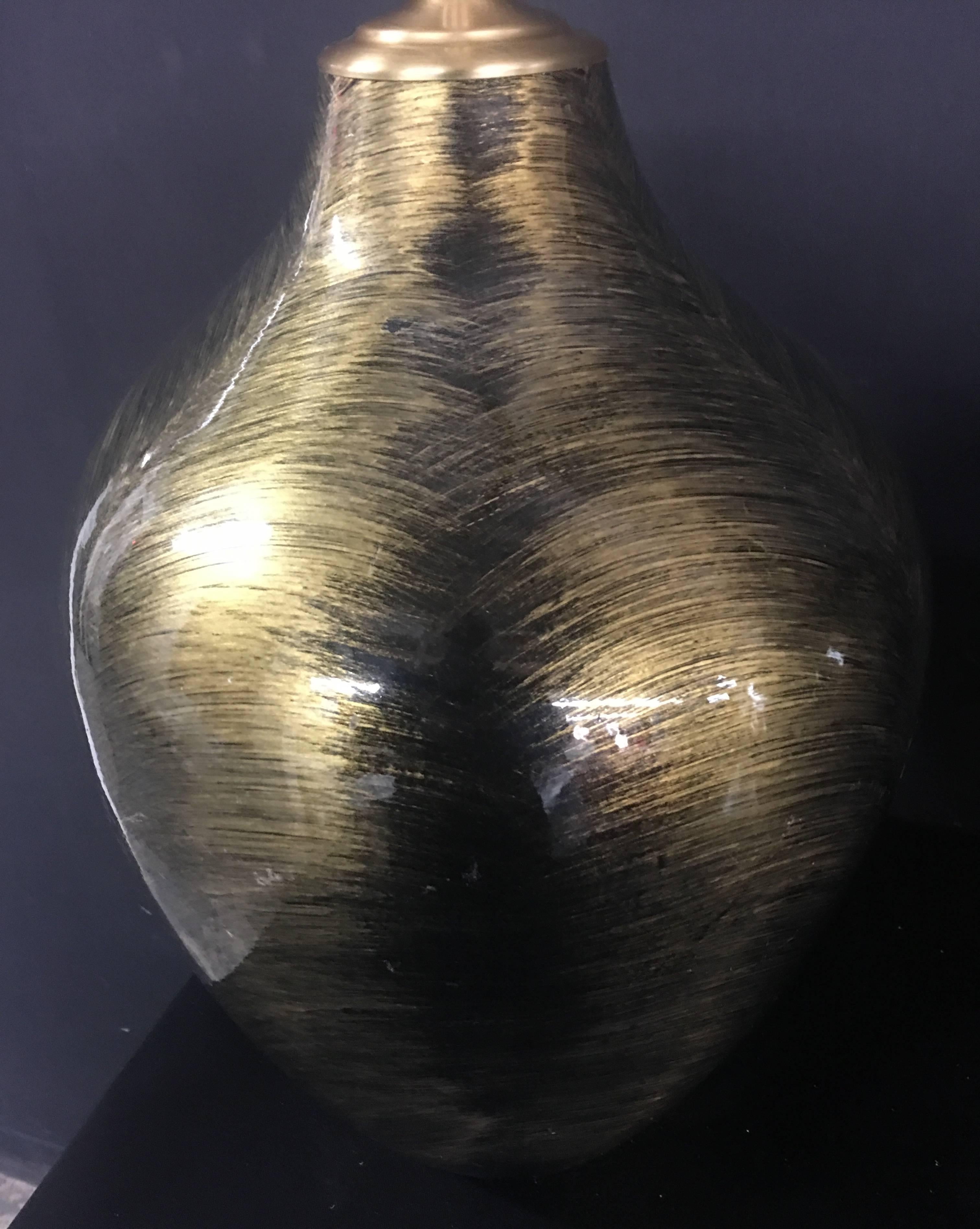 Unknown Pair of Luminescent Gold and Black Glazed Orbs with Lamp Application For Sale