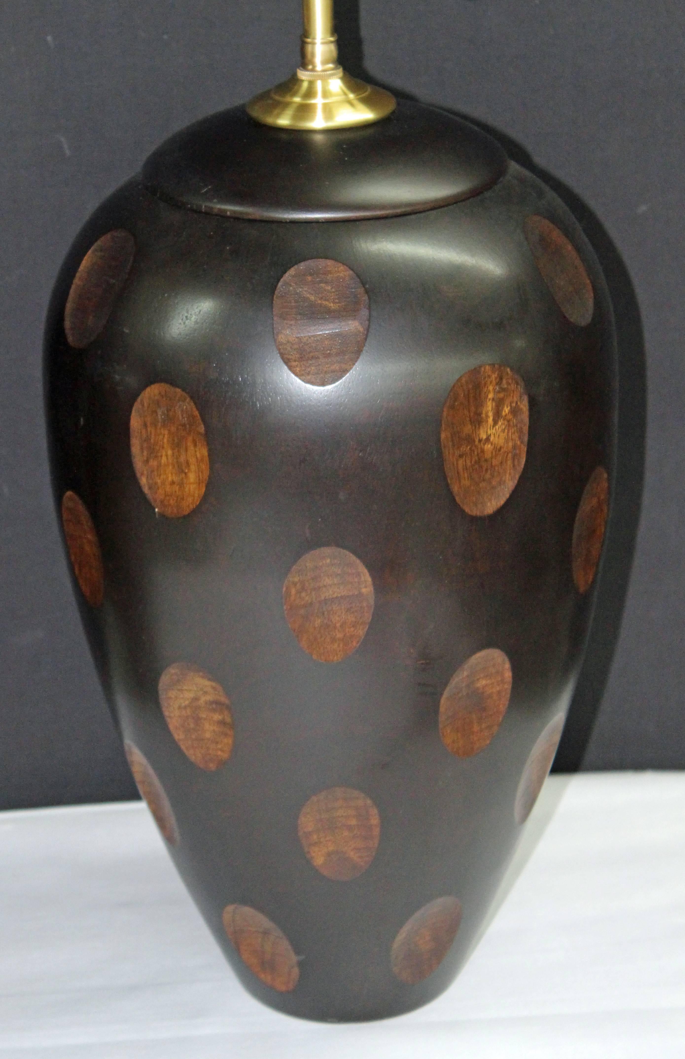 Unusual mahogany vessels with lamp application. The overall finish is espresso with egg shaped 