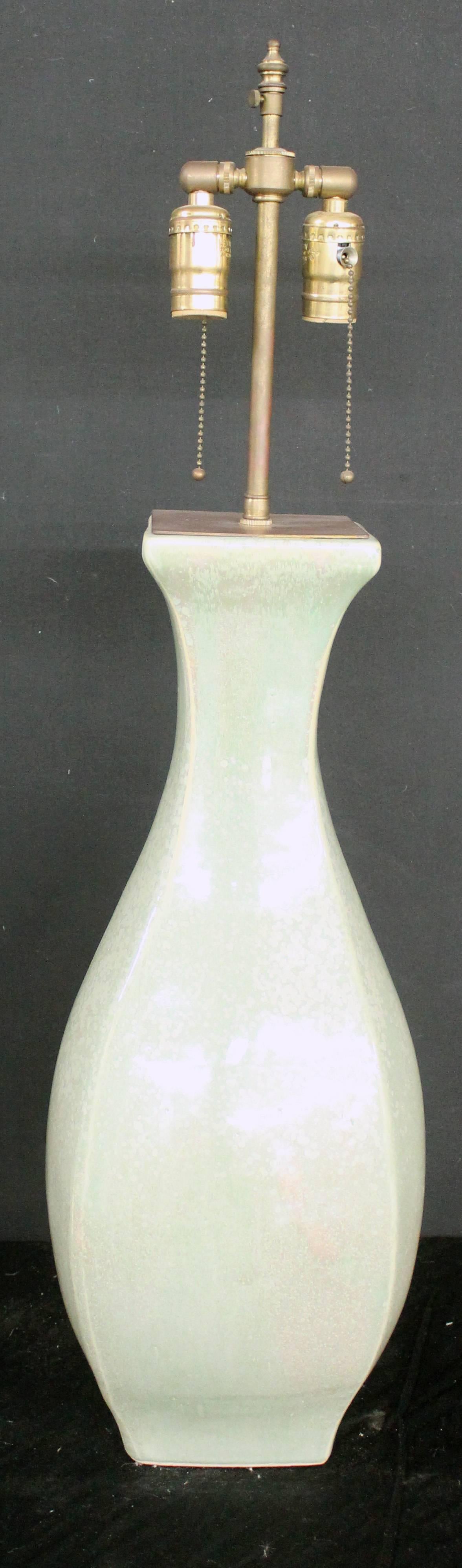 Curvaceous 1960's celadon table lamp.