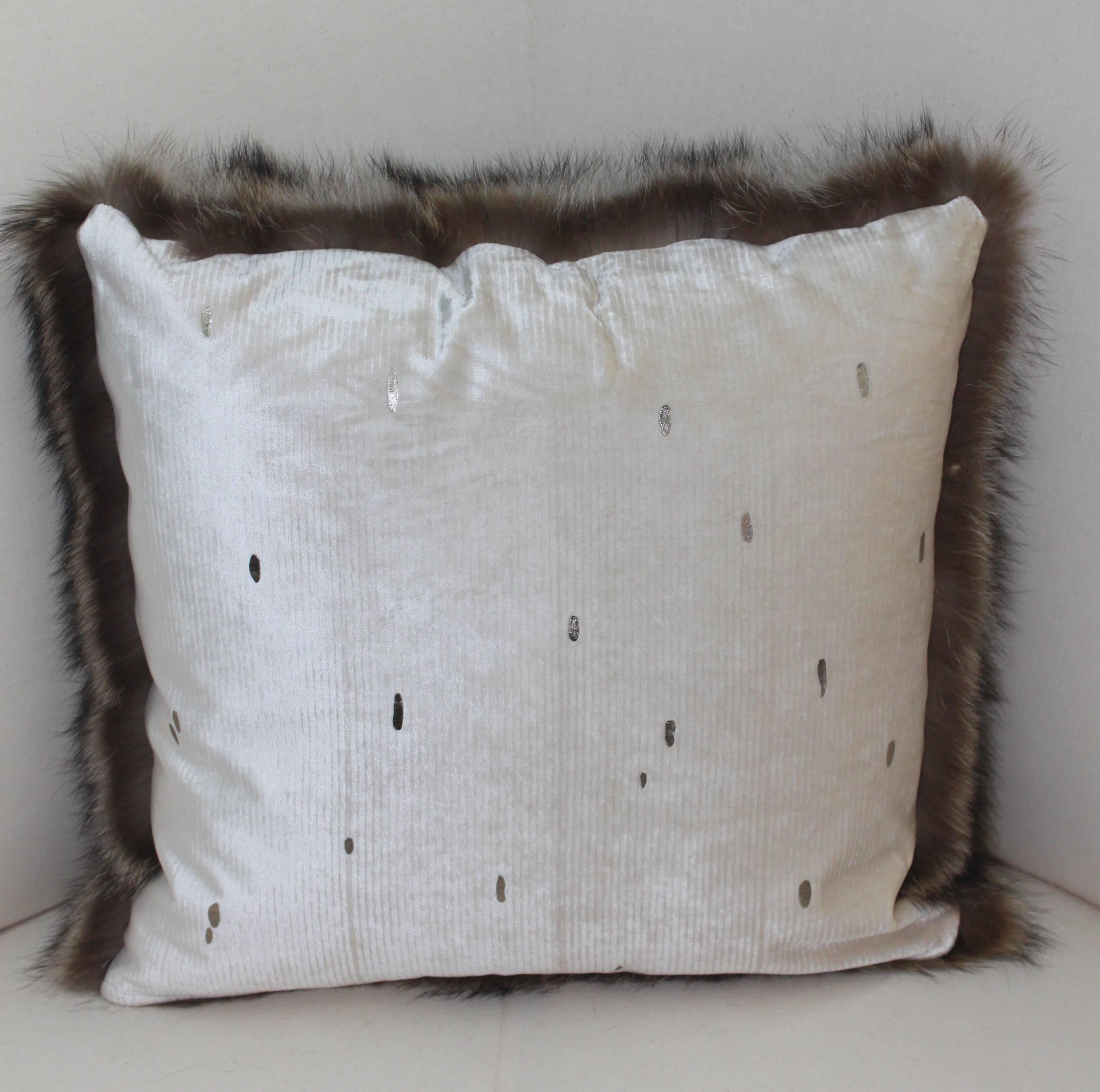 Luxurious down filled genuine Raccoon throw pillows. The furs have been fully refreshed are in great condition and filled with 50/50 down/down feathers. Six of the backs are finished in a custom silk velvet dotted with bronze accents.  Five are