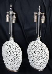 Unusual Pair of Cream Colored Ceramic Filigree Vessels with Lamp Application