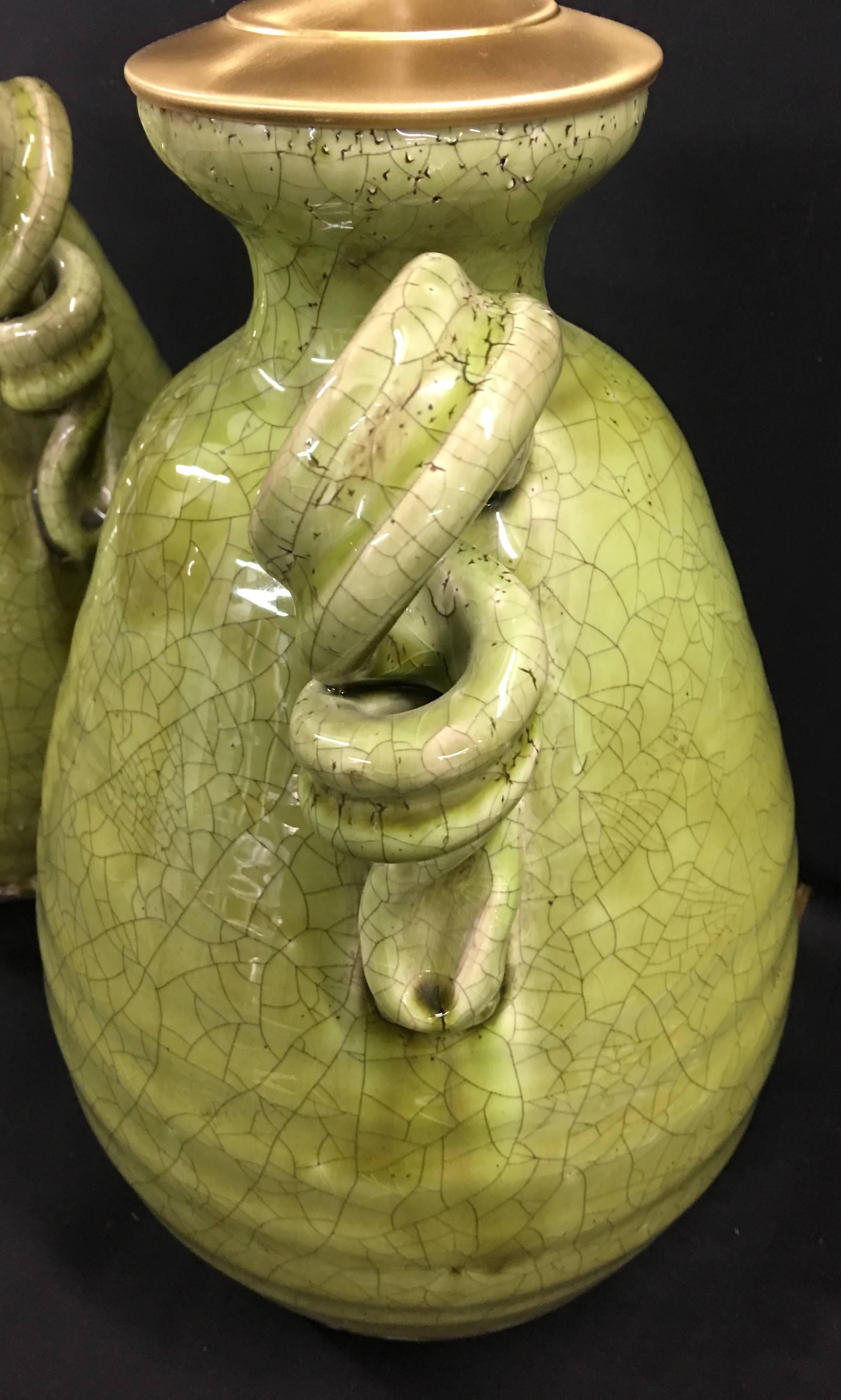 Spanish Unusual Pair of Apple Green Crackle Glazed Urns with Lamp Application