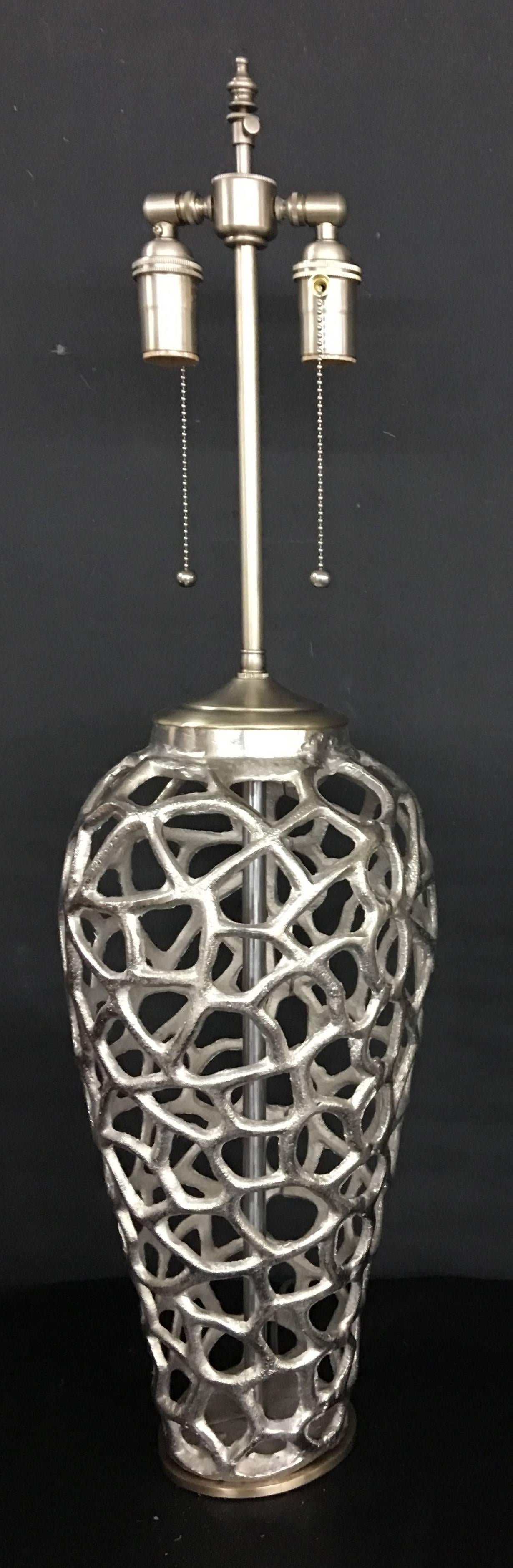 Unique newly wired pair of large cast metal vessels with lamp application. The hardware is brushed Nickel and comprises dual, individually controlled sockets. The vessel height is 18.5