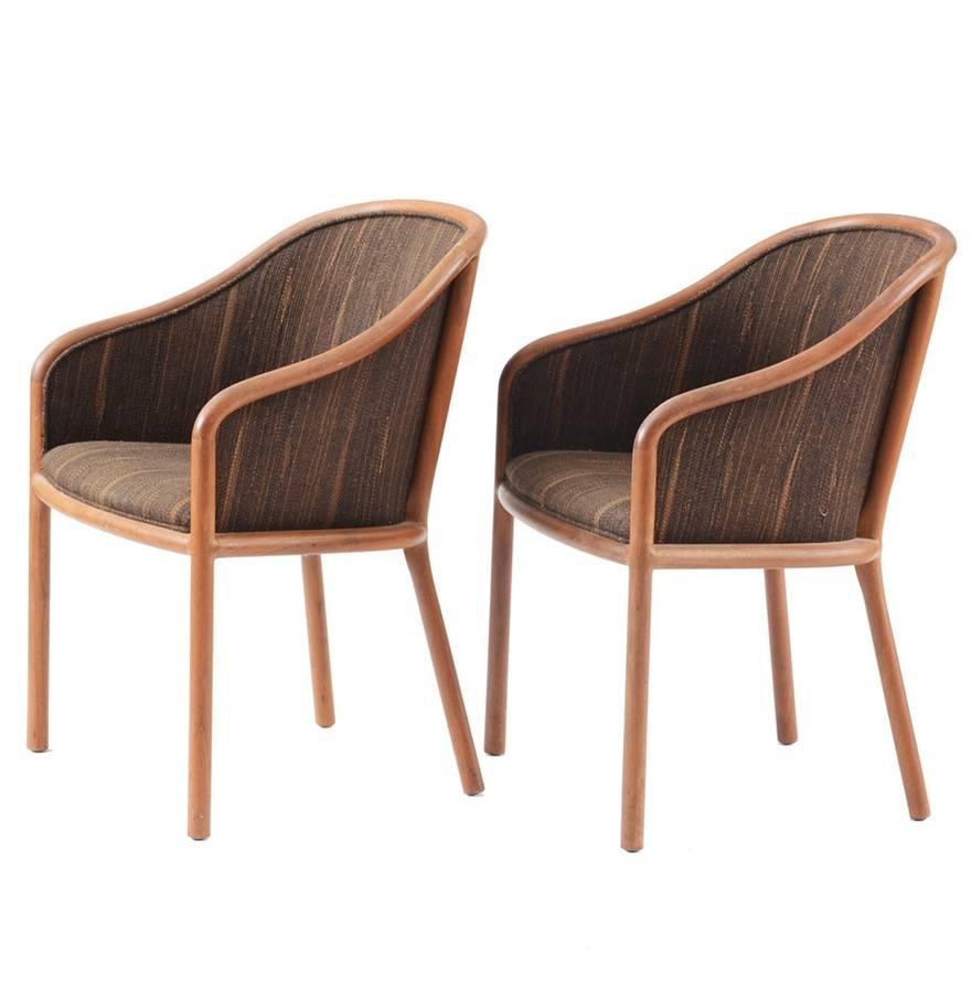 A pair of teak armchairs, each having a curvilinear frame, upholstered in a brown and black slub textured fabric, circa 1980s.