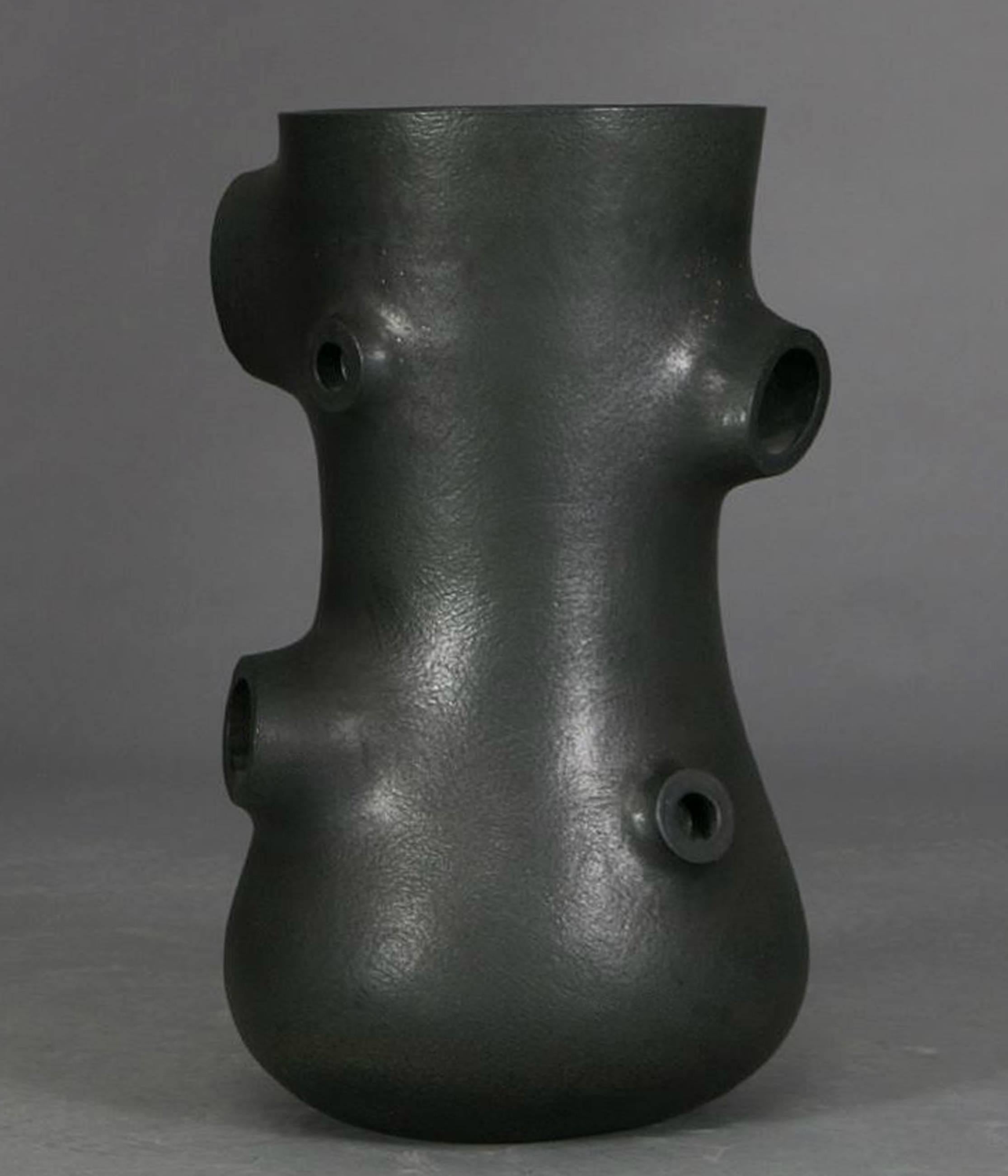 An abstract sculptural black ceramic vessel by Martin Bodilsen Kaldahl: Signed MBJ 03. Martin Bodilsen Kaldahl Born 1954 in Denmark. Education: Royal College of Art, London. MA RCA Ceramics and Glass, 1988 - 1990: Collections,
Victoria & Albert