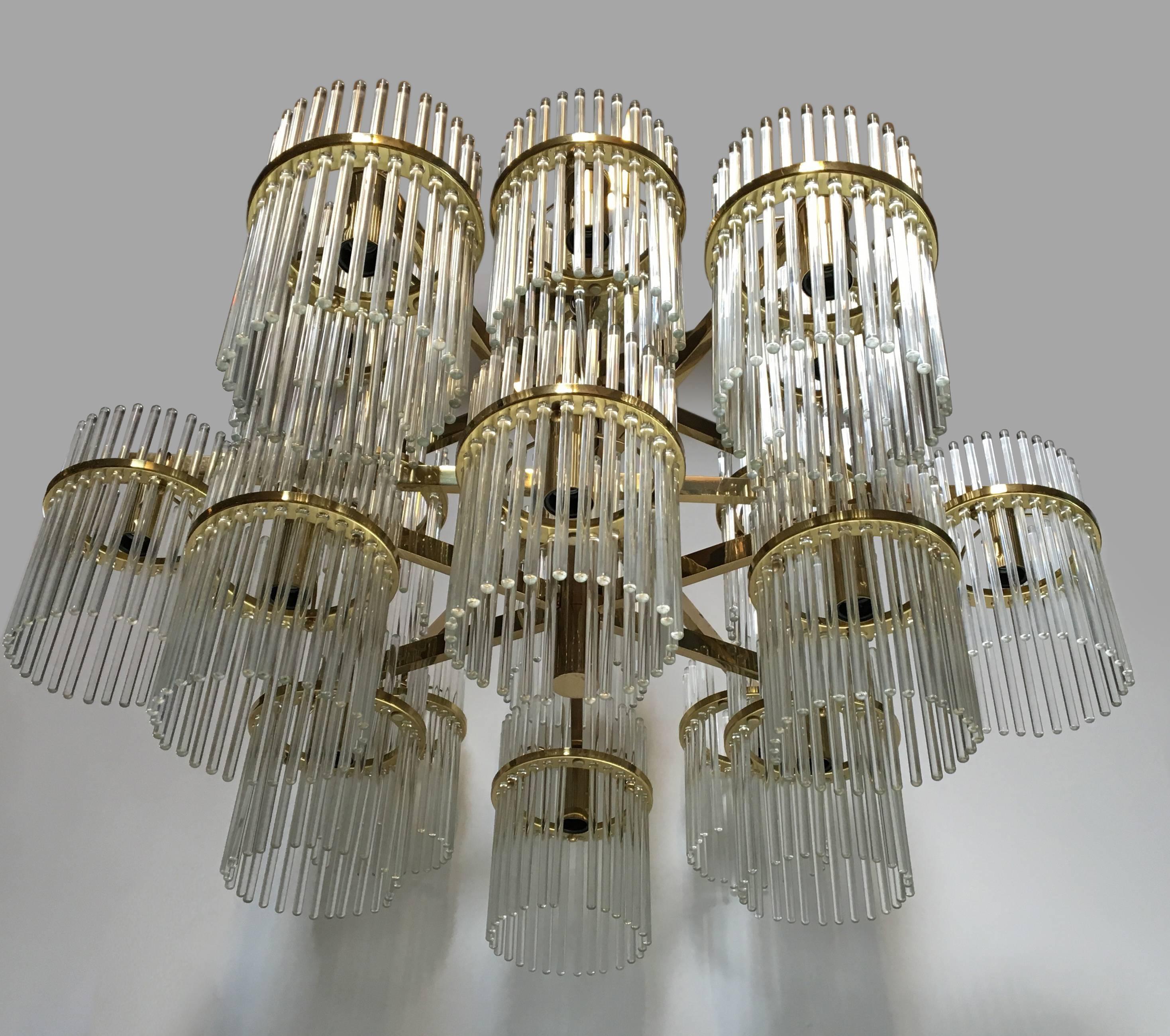 A large 18 arm brass and glass chandelier by Gaetano Sciolari (with label).

Italian, Circa 1970's