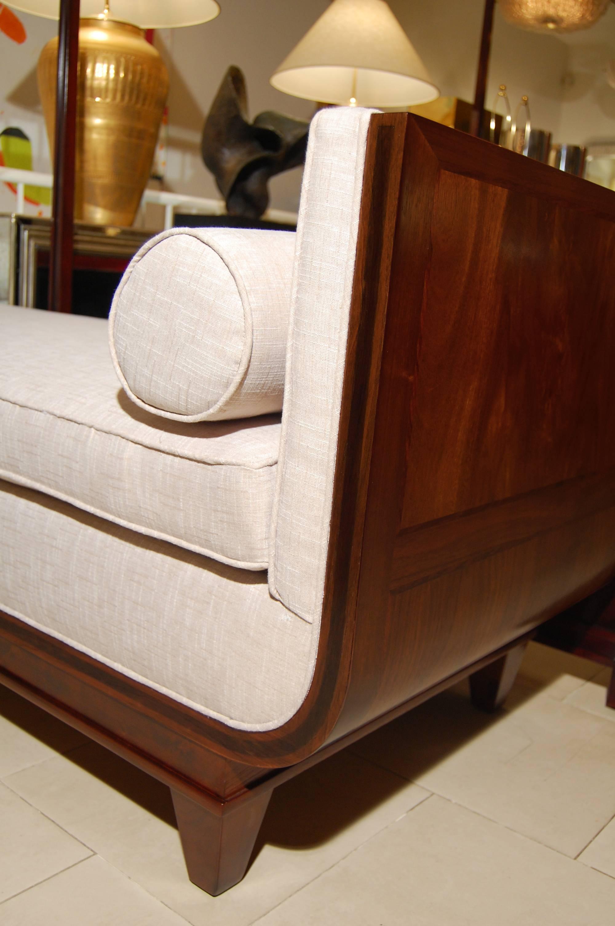 An elegant German daybed in crotch mahogany.

Circa 1940's

In Stock.