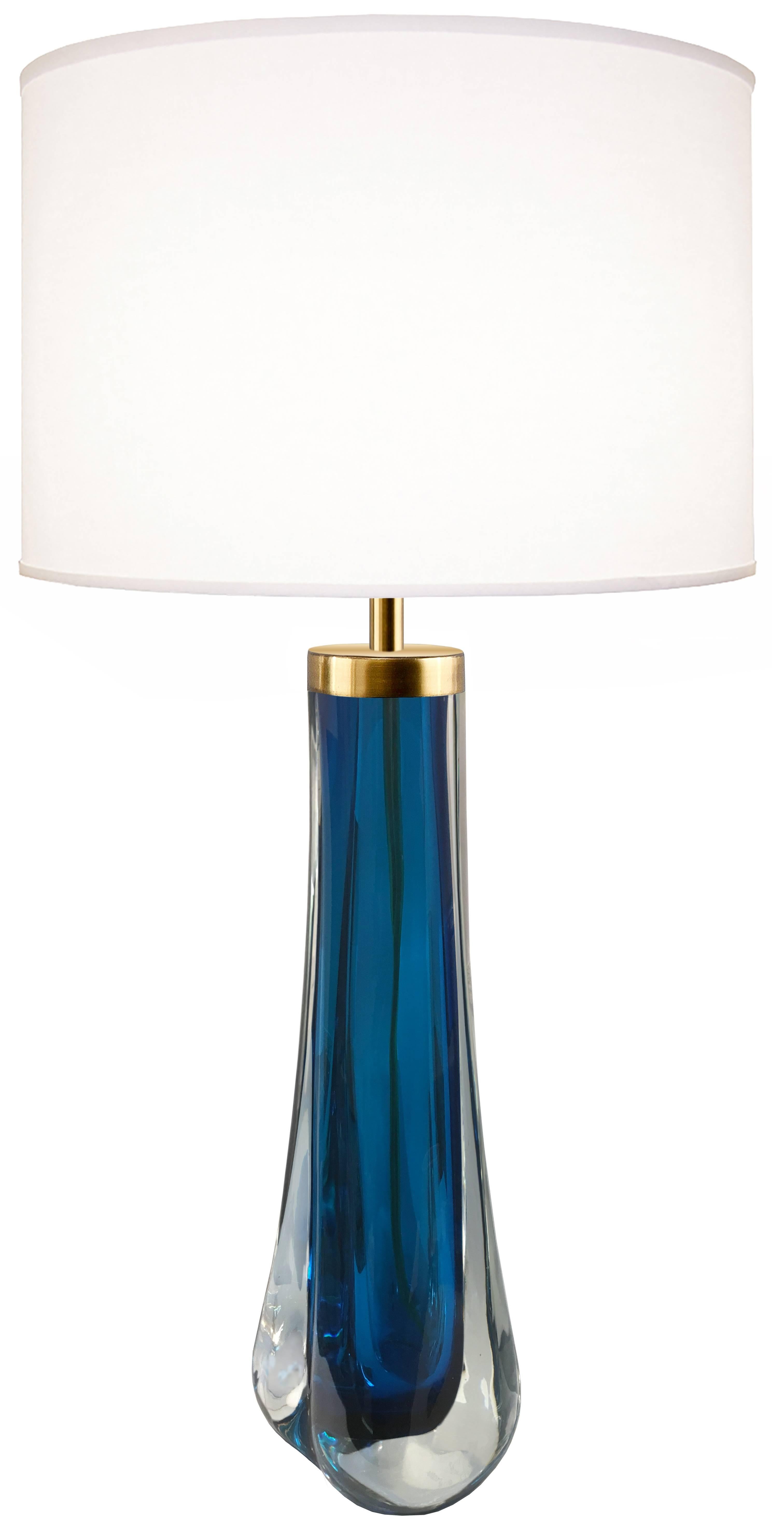 A pair of thick cased blue glass lamps with brass hardware from Craig Van Den Brulle. 

Custom colors available. 

Glass measurements 16