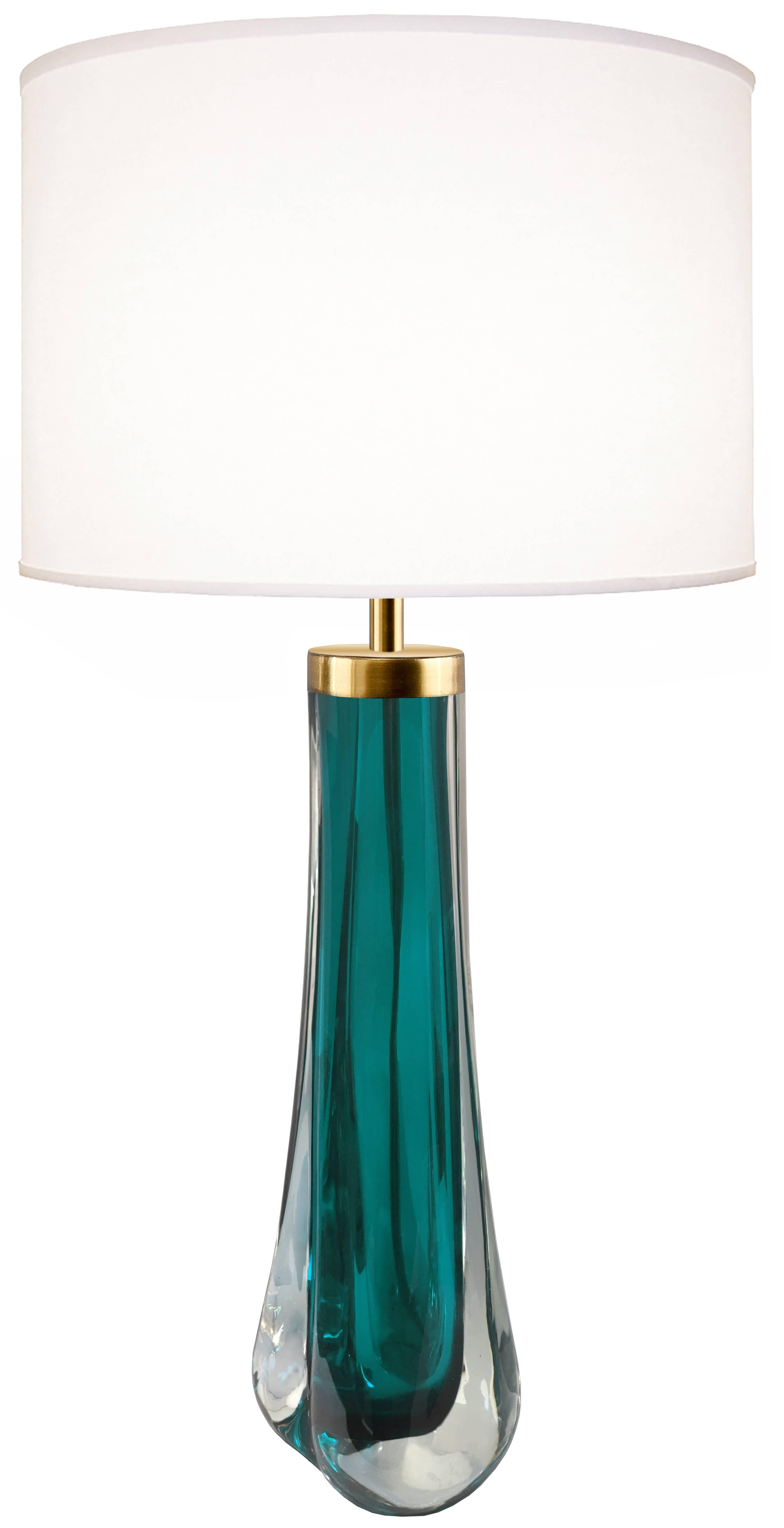 A pair of thick cased aqua glass lamps with brass hardware from Craig Van Den Brulle. 

Custom colors available. 

Glass measurements 16