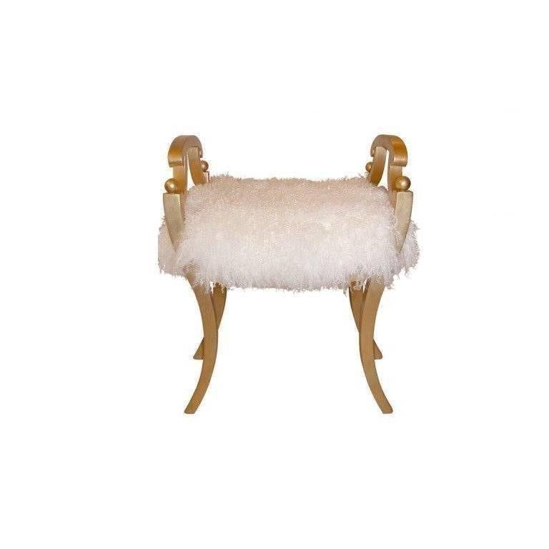 A gilt mahogany stool upholstered in curly lamb by Karl Johan.

Swedish.
