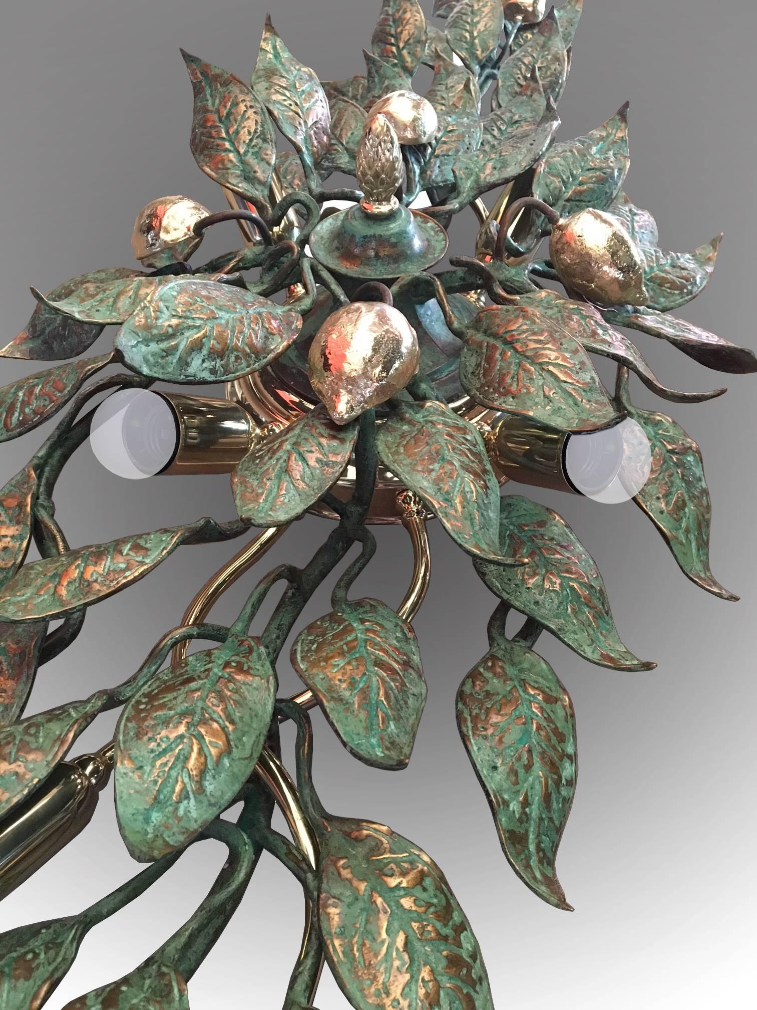 Patinated Pair of Large European Bronze Leaf Sconces For Sale