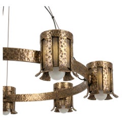 Chandelier a la manera de Edgar Brandt en acabado dorado · (Ø100 cm, 7 luces)