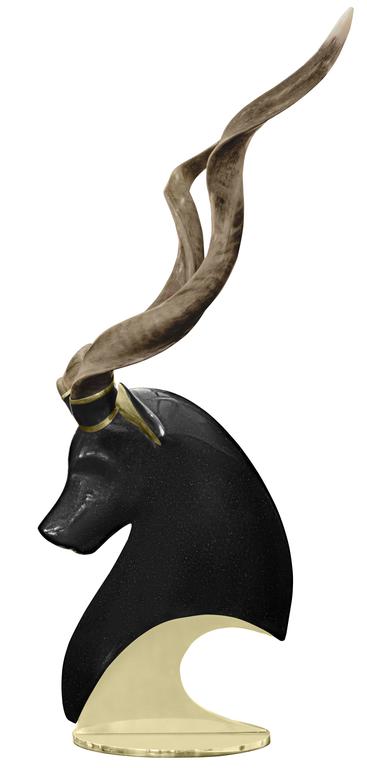 Large and impressive kudu sculpture, head in iridescent gunmetal faux granite nitrocellulose lacquer over a fiberglass casting with solid brass base and authentic horns, by Roberto Estevez for Karl Springer, American, 1980s.

Roberto Estevez was an
