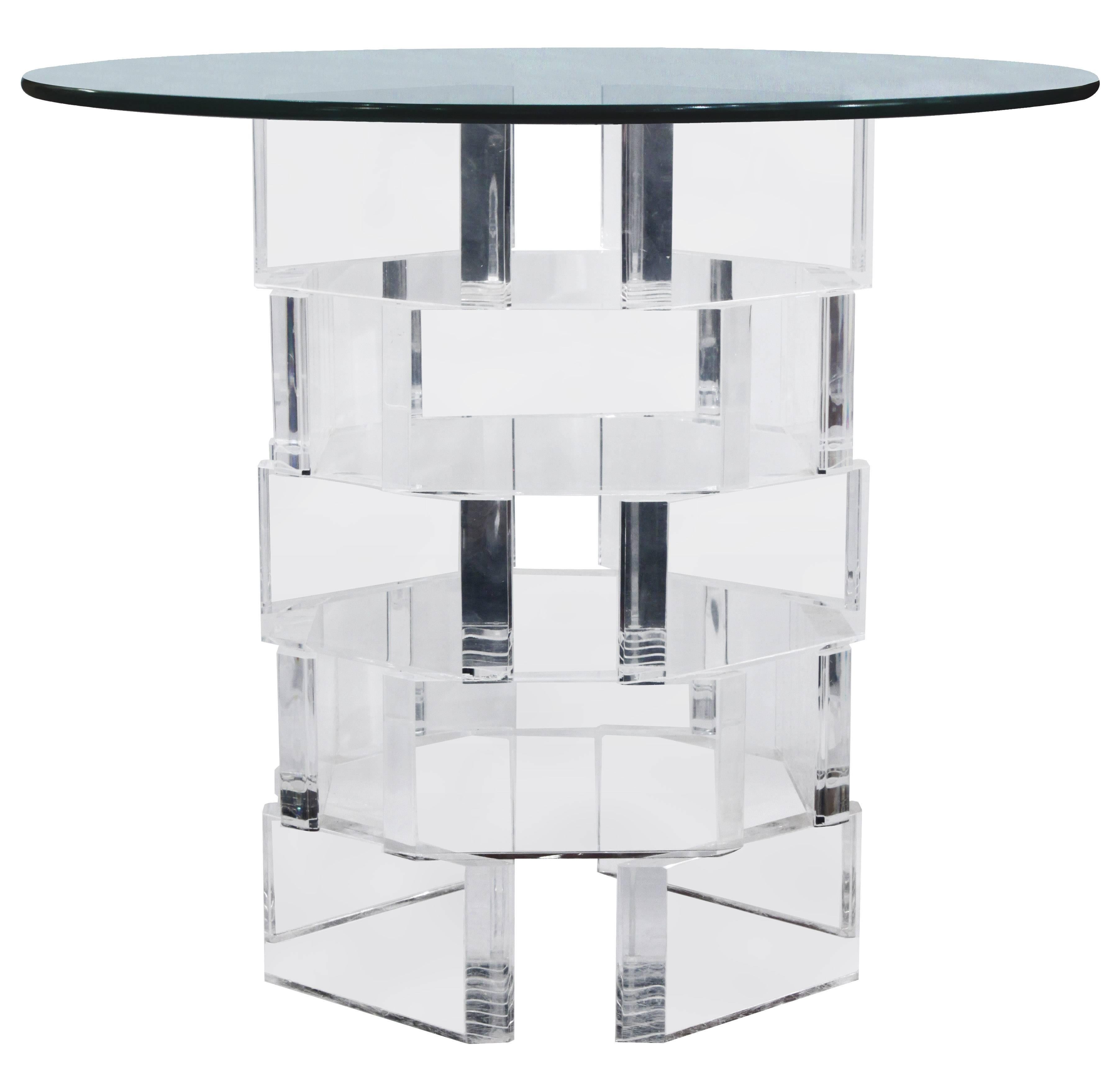 Chic side table the base in stacked Lucite blocks with a glass top, American, 1970s. The base is 13 inches wide by 13 inches deep.