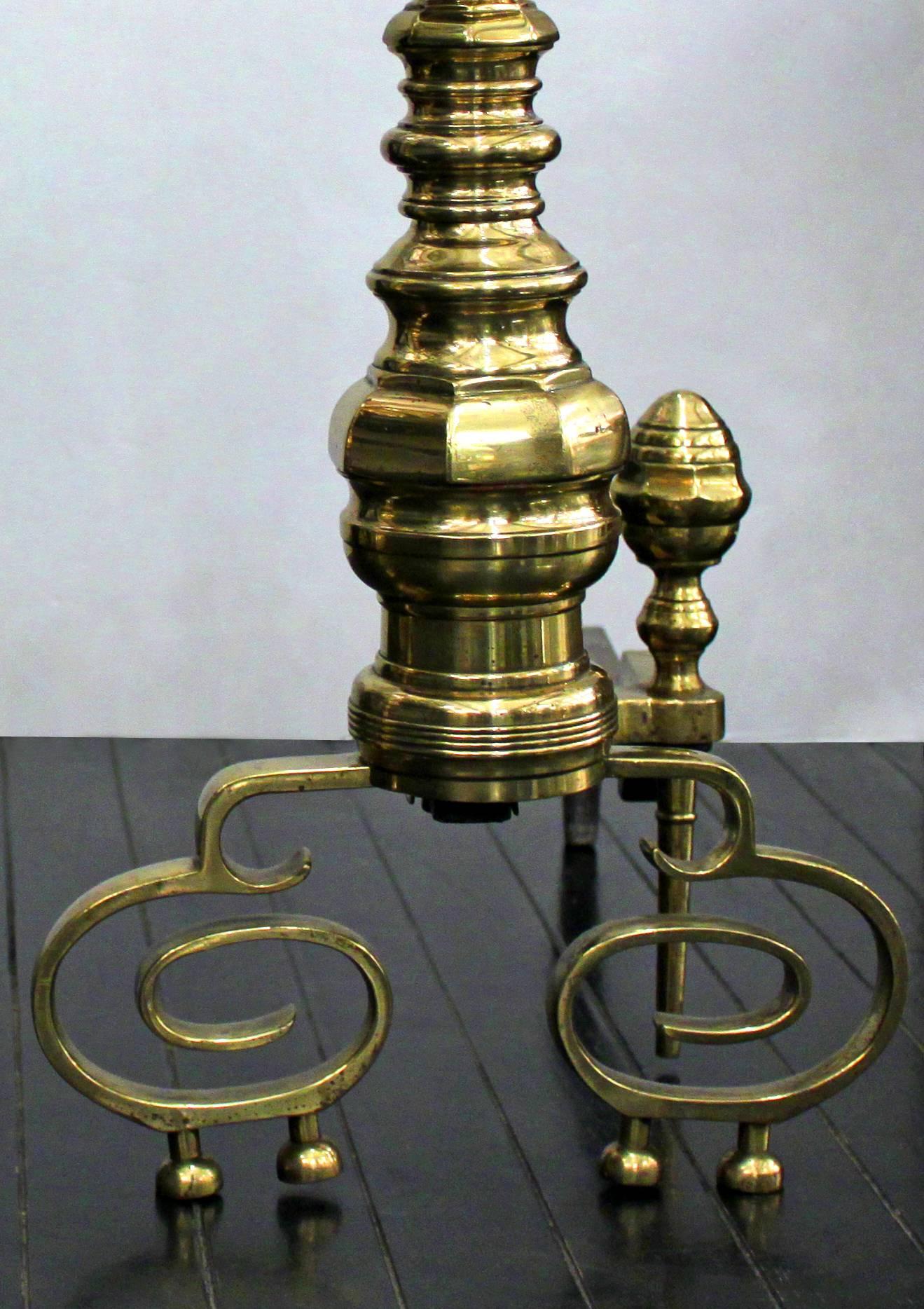 Pair of large and exceptional decorative andirons in polished brass, American, 1970s.  These are very high quality.
    