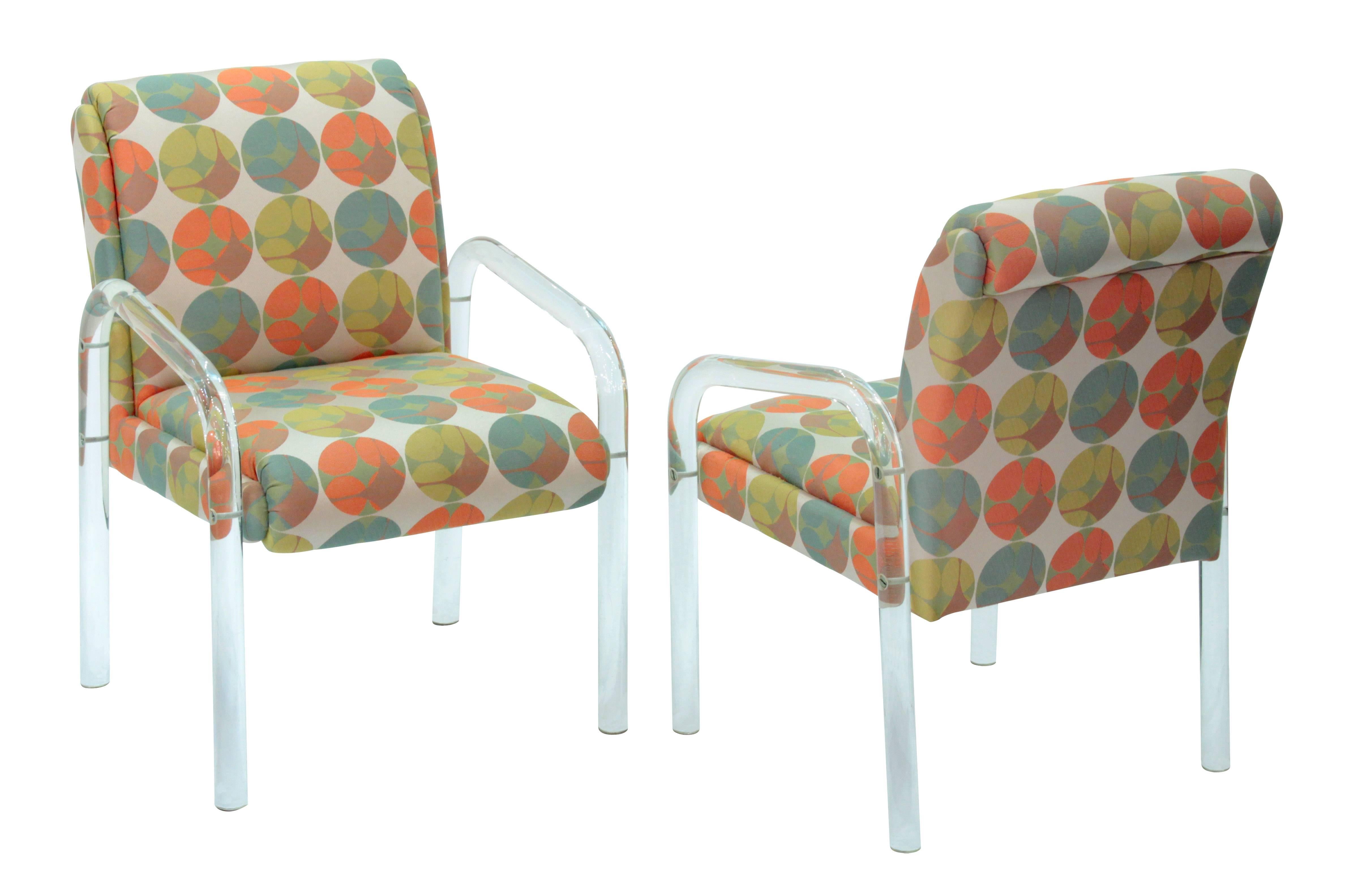 Set of four dining / game chairs in Lucite with geometric printed fabric by Leon Rosen for Pace Collection, American, 1970s.
