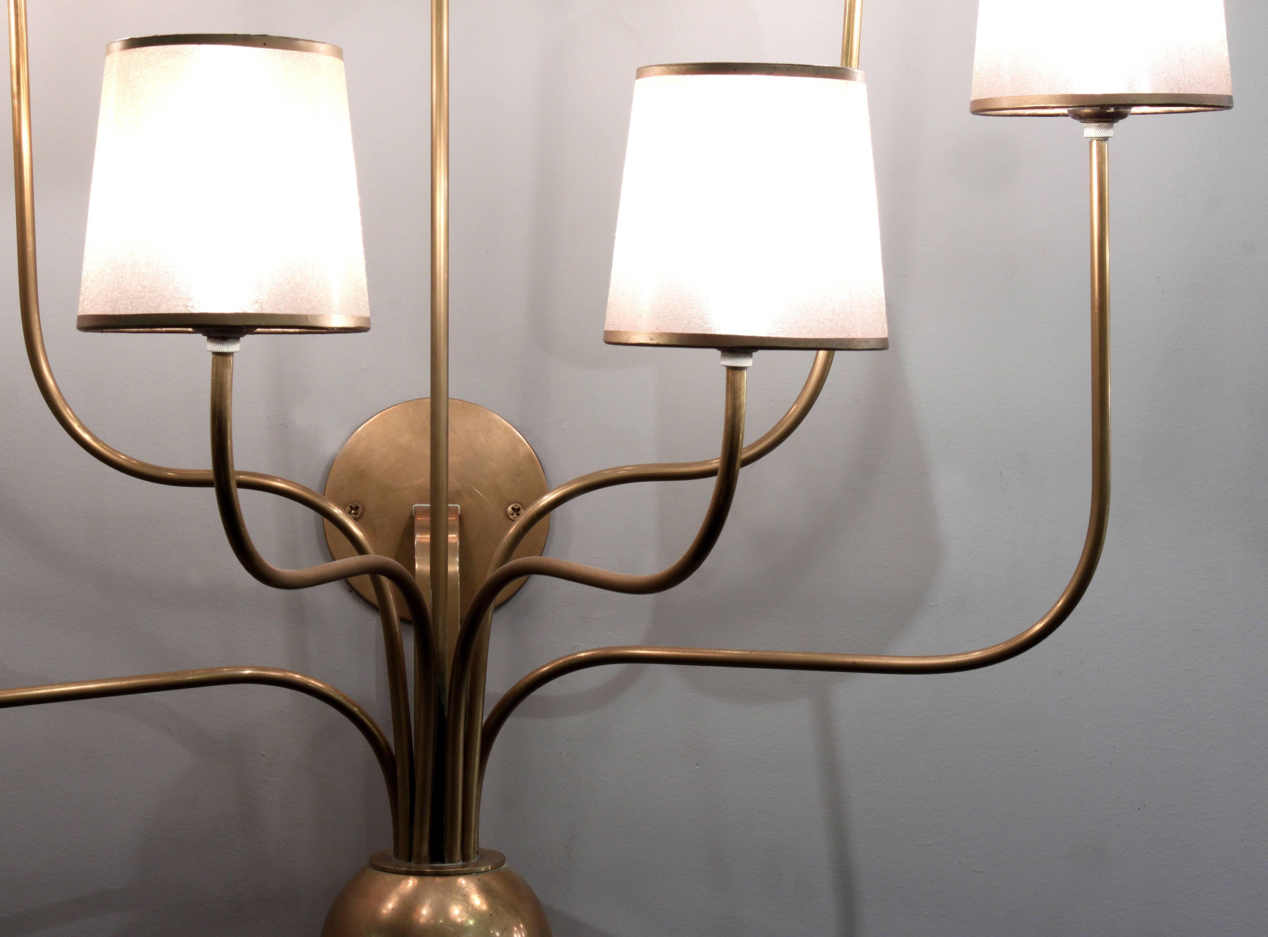 Pair of 7 arm sconces in brass, American 1990's.  The scale of these sconces makes them impressive and very chic.