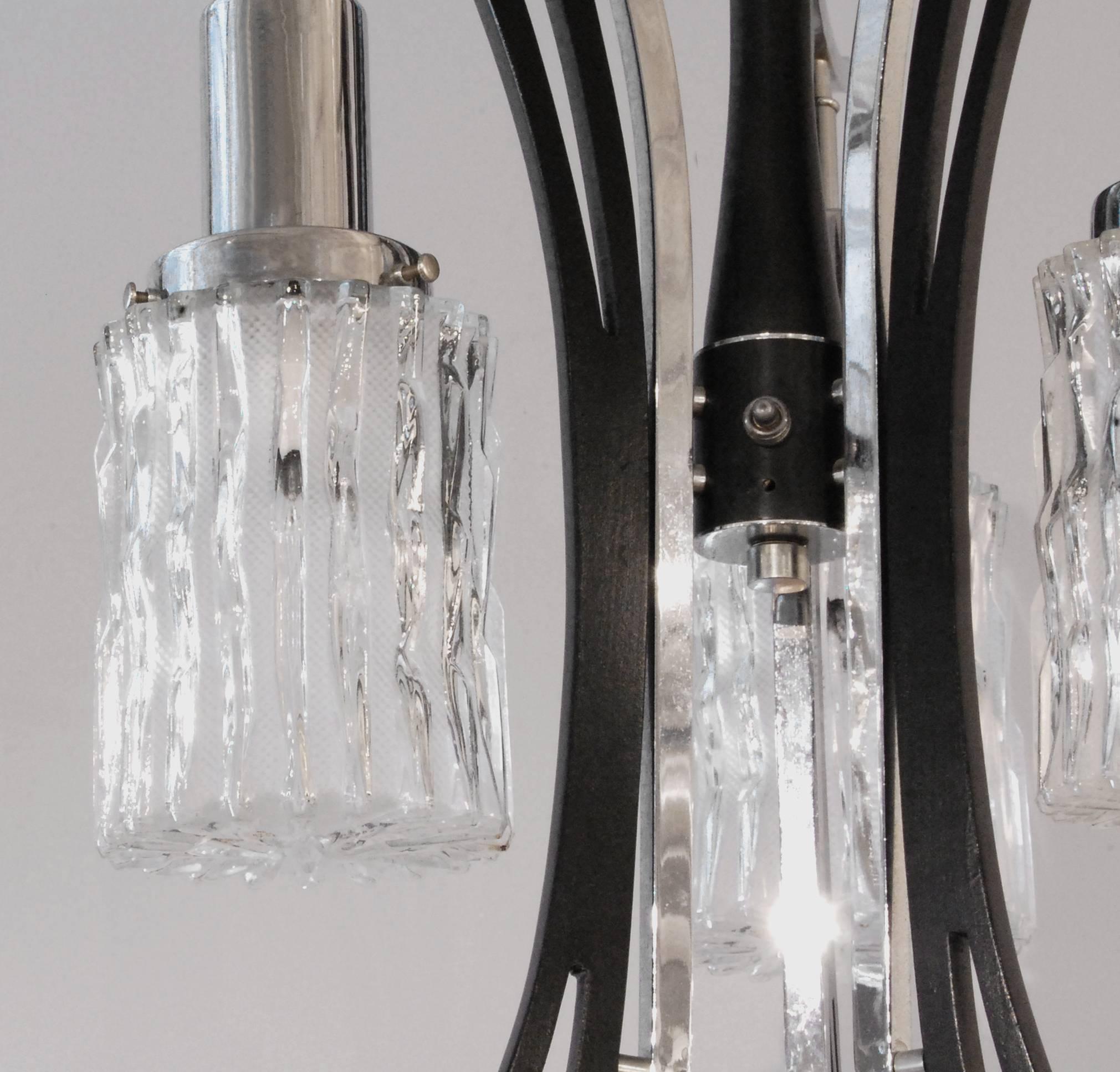 Chinese style chandelier with three molded glass shades, American, 1960s.
The drop of this chandelier can be customized with a different chain or rod.
   
