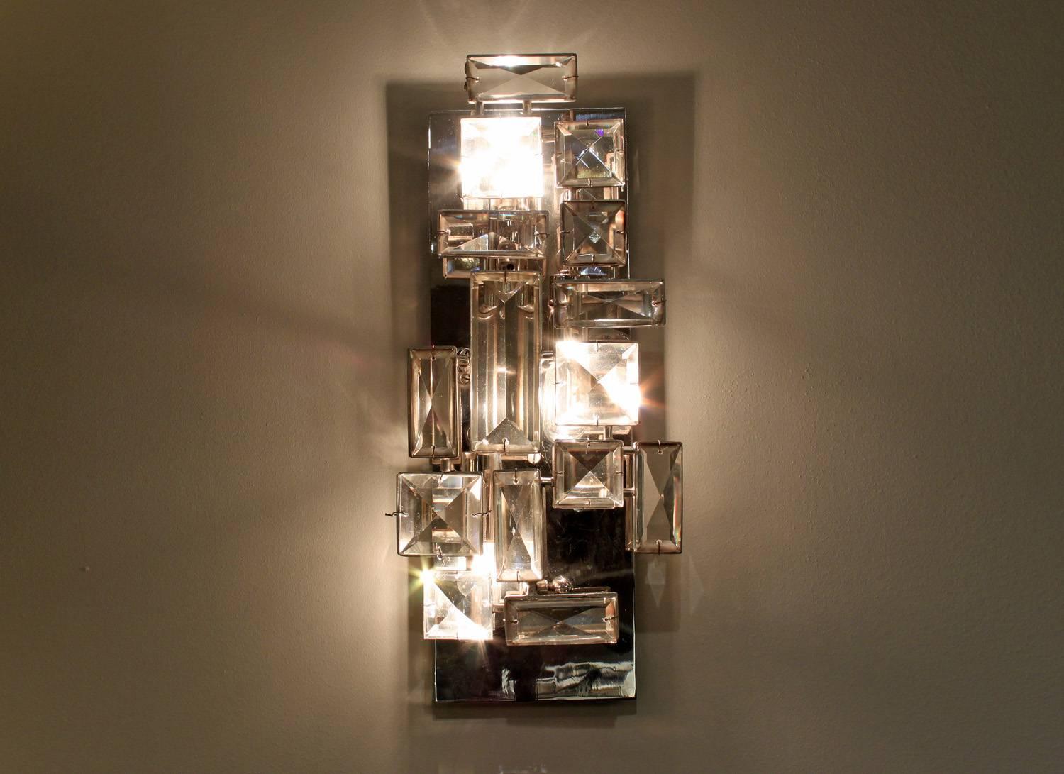 Exceptional sconce in chrome-plated steel with faceted crystals designed by Hans Harald Rath for J. & L. Lobmeyr, Vienna, Austria, circa 1966 (signed in metal 