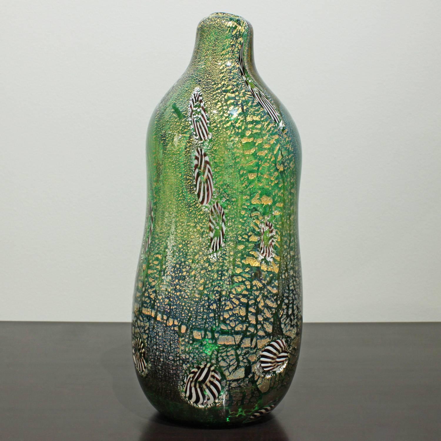 Handblown glass vase from the Yokohama series, green glass with murrhines and silver foil, by Aldo Nason for Arte Vetraria Muranese (A.V.E.M.), Murano Italy, 1960s (signed on bottom).
   
