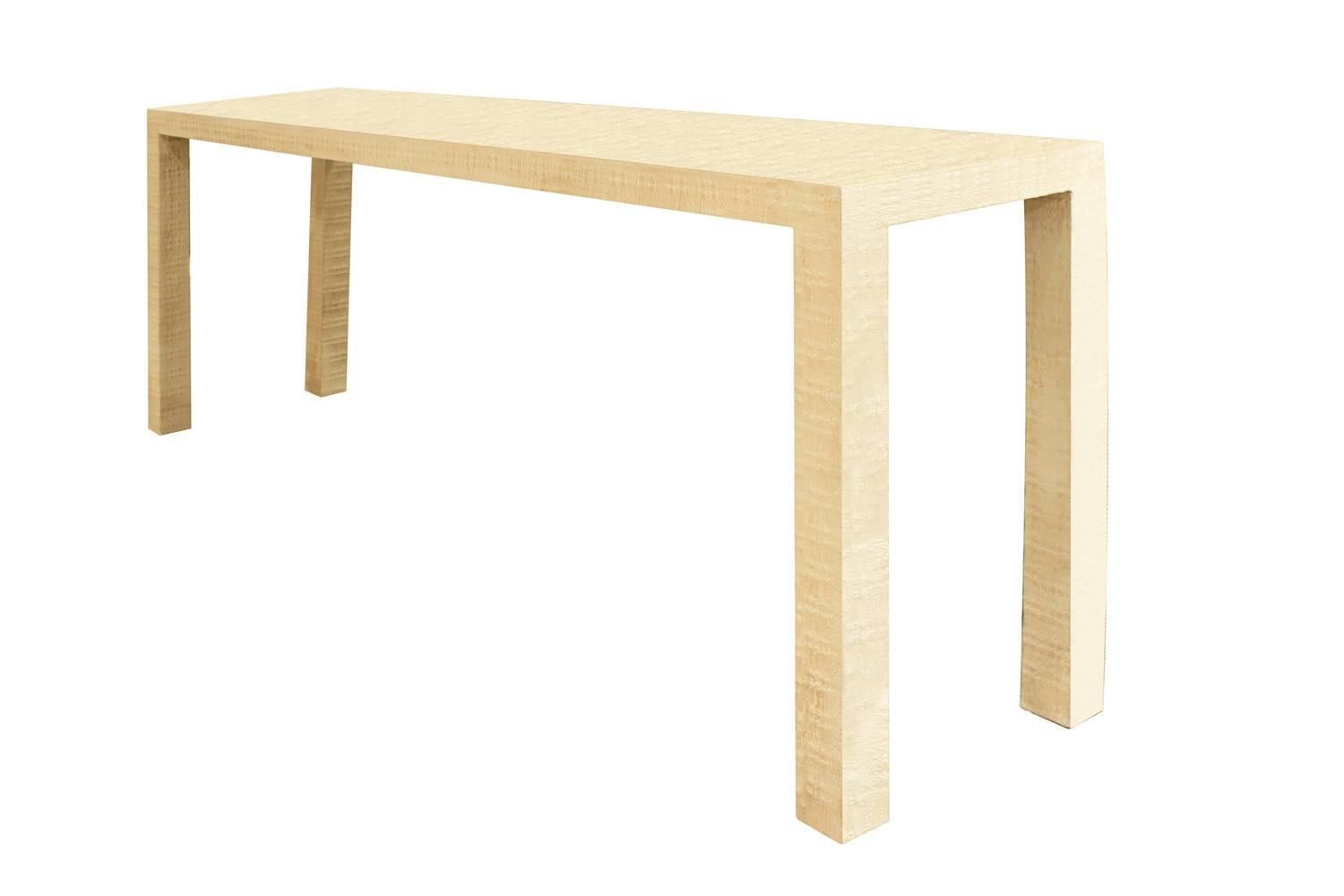 Parsons style console table covered in lacquered grass cloth, custom design, American 1970s.