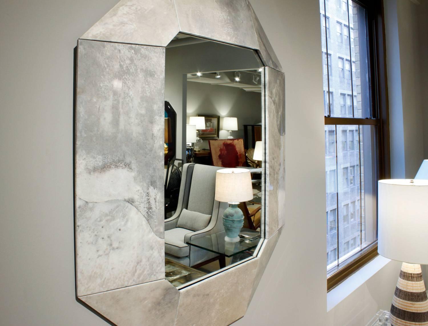 Large wall-hanging mirror with frame in lacquered goatskin by Karl Springer, American, 1988. This is a wonderful example of Springer's designs.