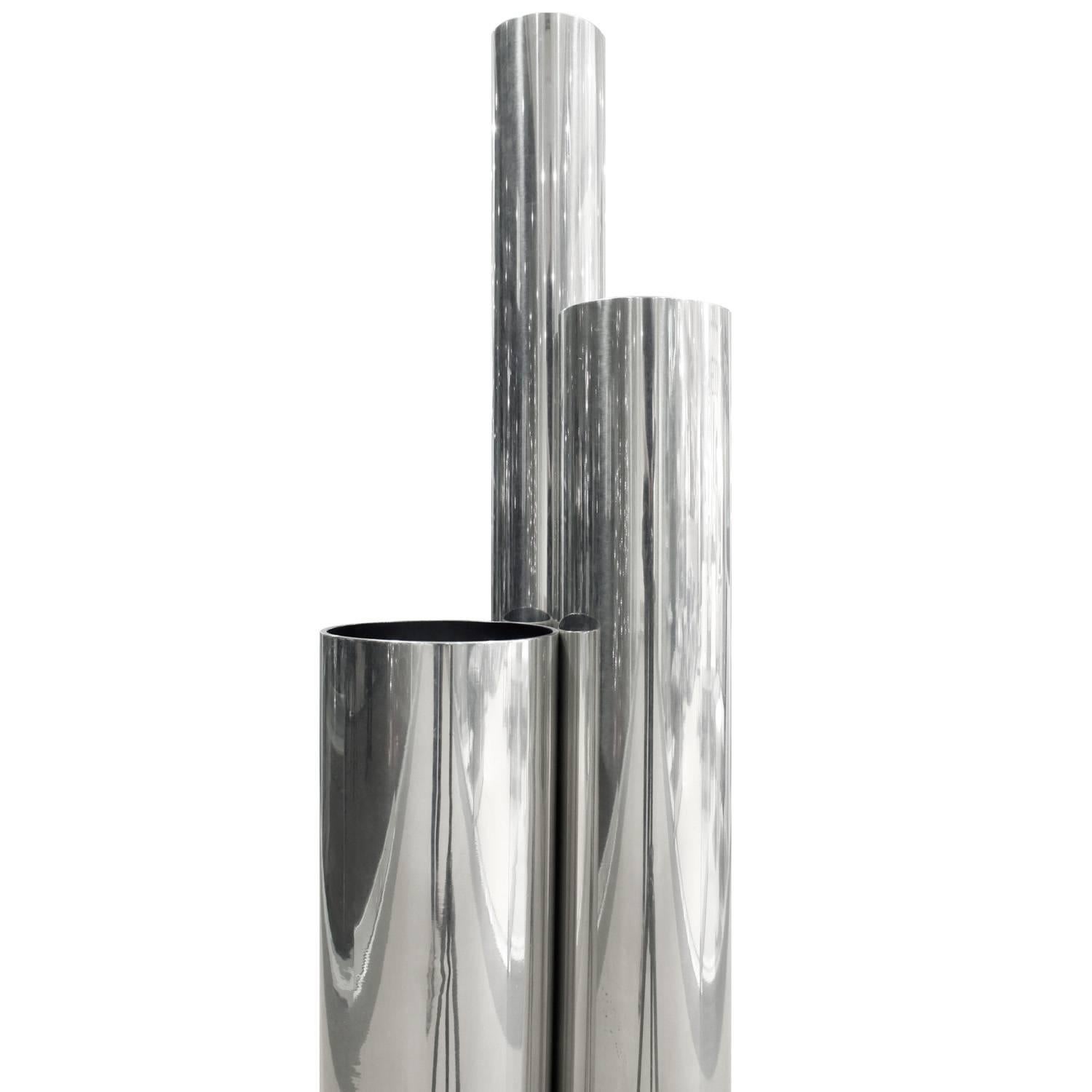 Skyscraper floor lamp in polished chrome with three up lights by Vladimir Kagan, American, 1970s.