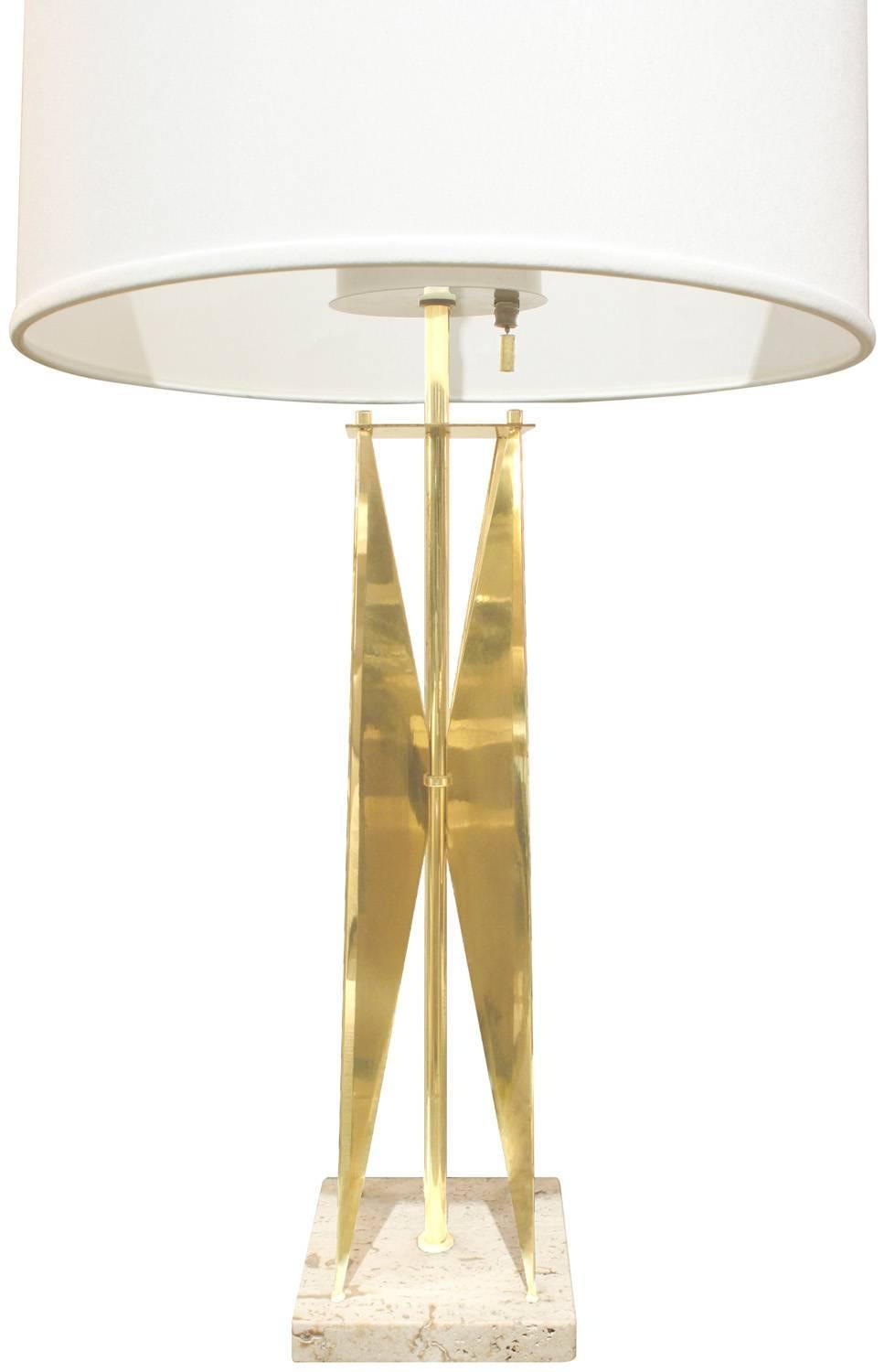 Sculptural table lamp in brass with travertine base and three bulb assembly by Gerald Thurston for Lightolier, American, 1950s.