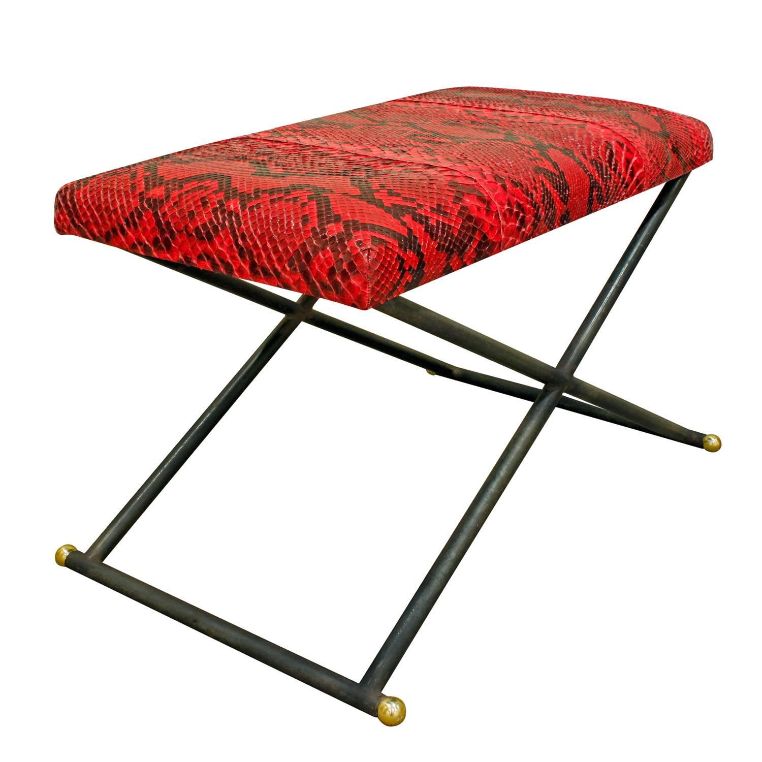 Rare X-bench in steel with brass accents and stitched python seat by Karl Springer, American, 1970s.

Reference:
Karl Springer catalog, published in the 1970's, shows a photo of this bench on page 51.
 