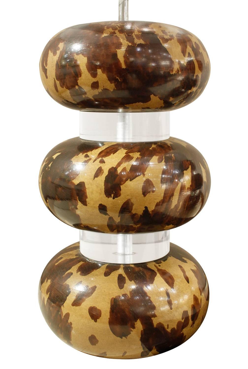 Pair of exceptional table lamps with tortoise shell lacquered sections separated by thick Lucite discs by Karl Springer, American, 1970s. Each lamp has two bulbs.
