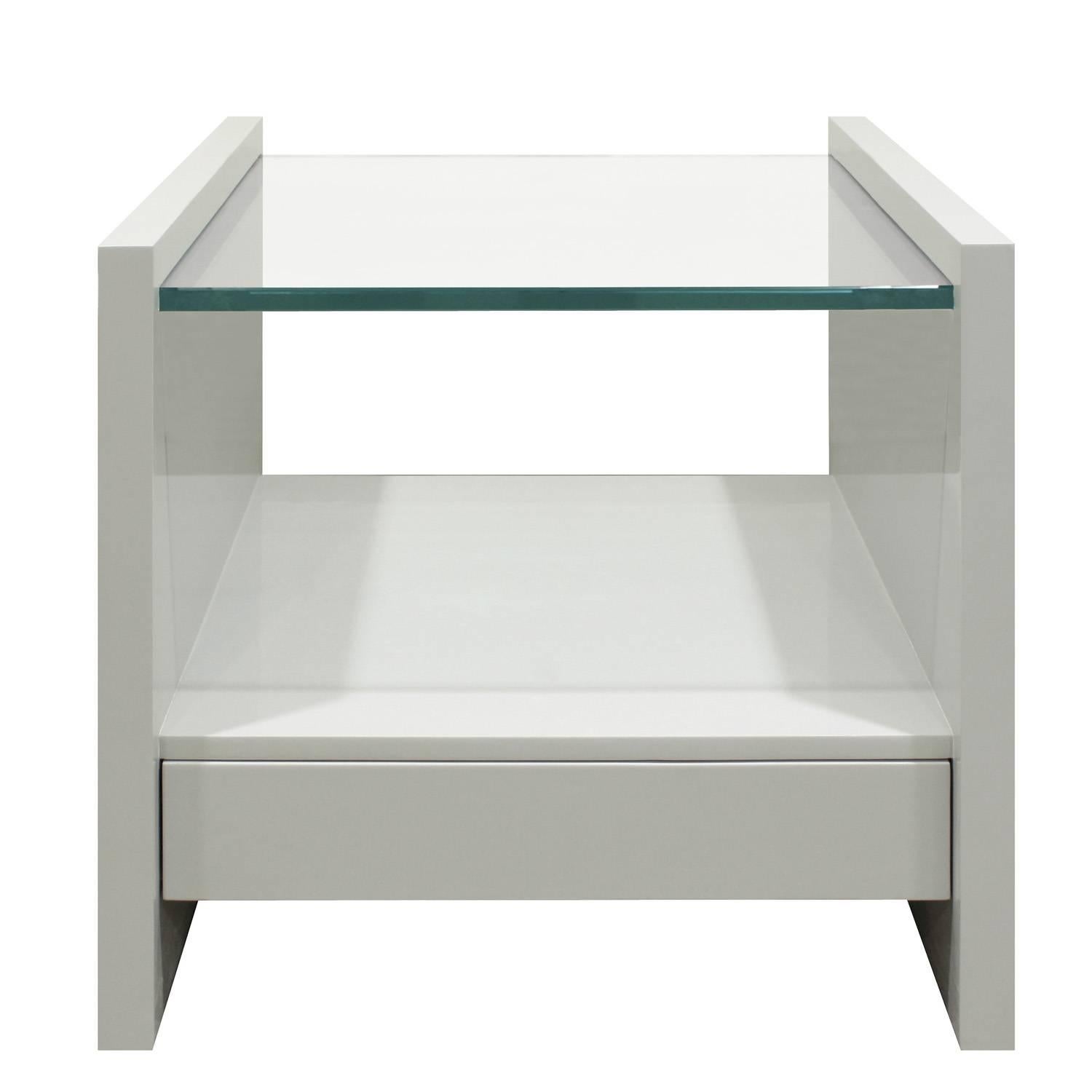 Pair of clean line bedside tables in gray lacquer with drawer and glass shelf by Karl Springer, American 1970s. Newly lacquered by Lobel Modern.
