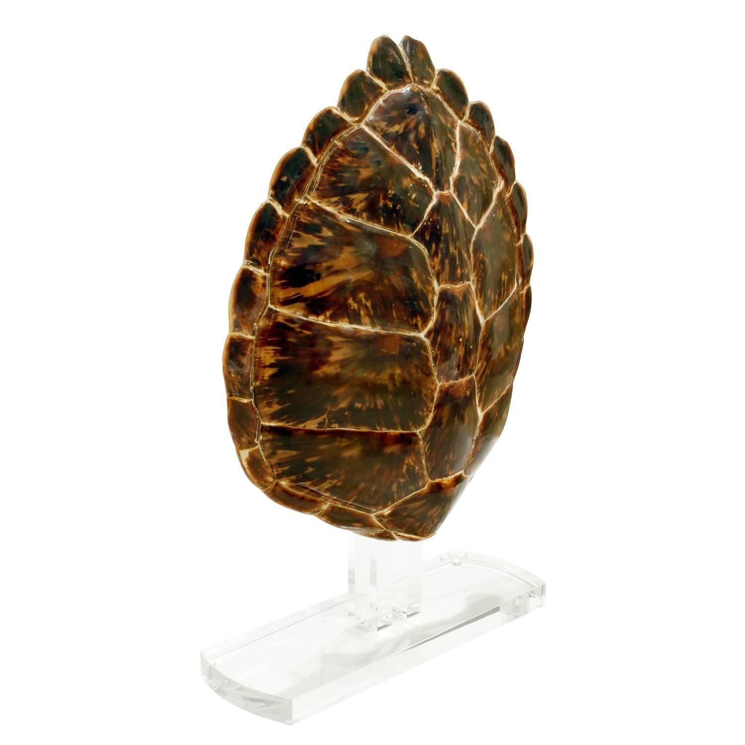 Authentic tortoise shell mounted on a thick Lucite base by Karl Springer, American, 1970s.