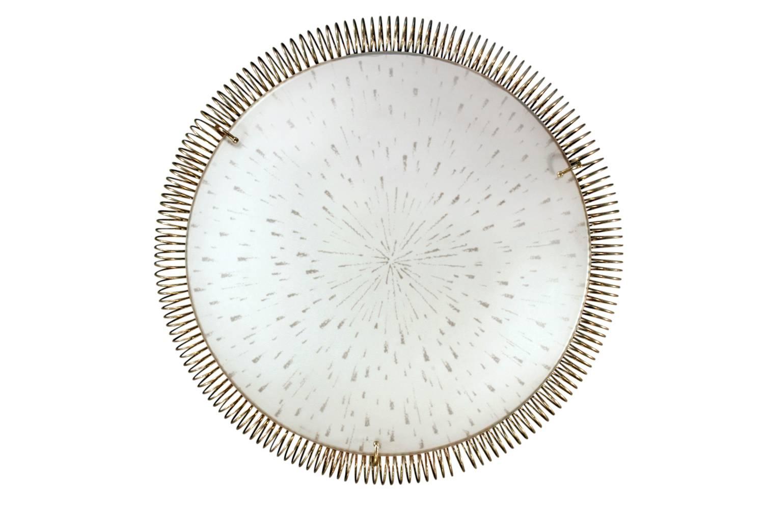 Ceiling mount fixture in brass with white textured glass shade by Gerald Thurston for Lightolier, American, 1960s.