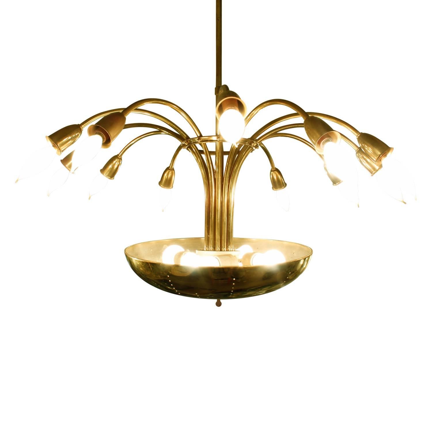 Elegant chandelier in brass with curved arms and perforated bottom, Italian, 1950s.