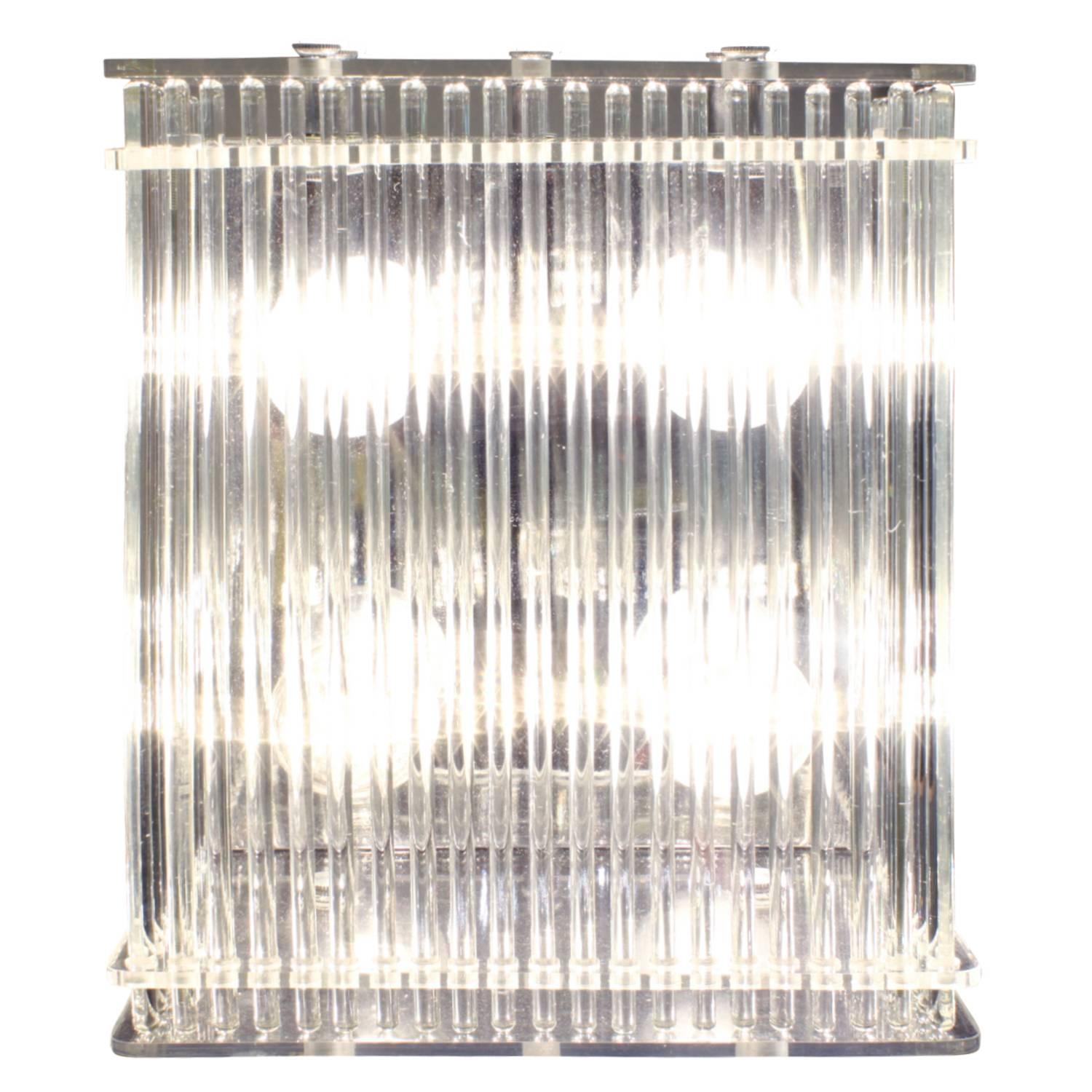 Flush mount ceiling fixture or wall sconce in Lucite with glass rods all around by Lightolier, American, 1970s. The light diffuses through the glass rods beautifully.