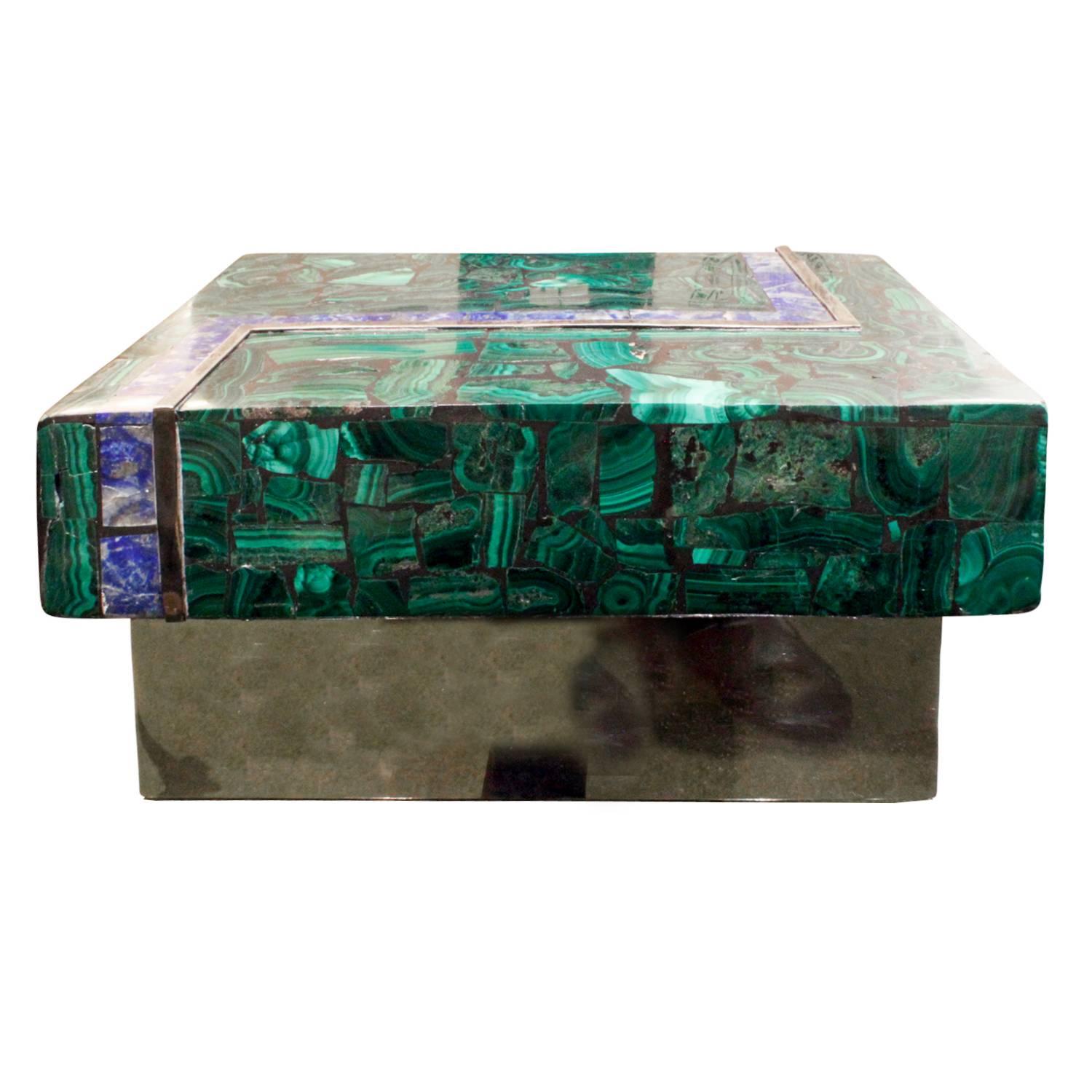Box in stainless steel with cover clad in semi precious malachite and lapis lazuli with silver accents by Karl Springer, American, 1970s. The interior of the box is covered in leather.