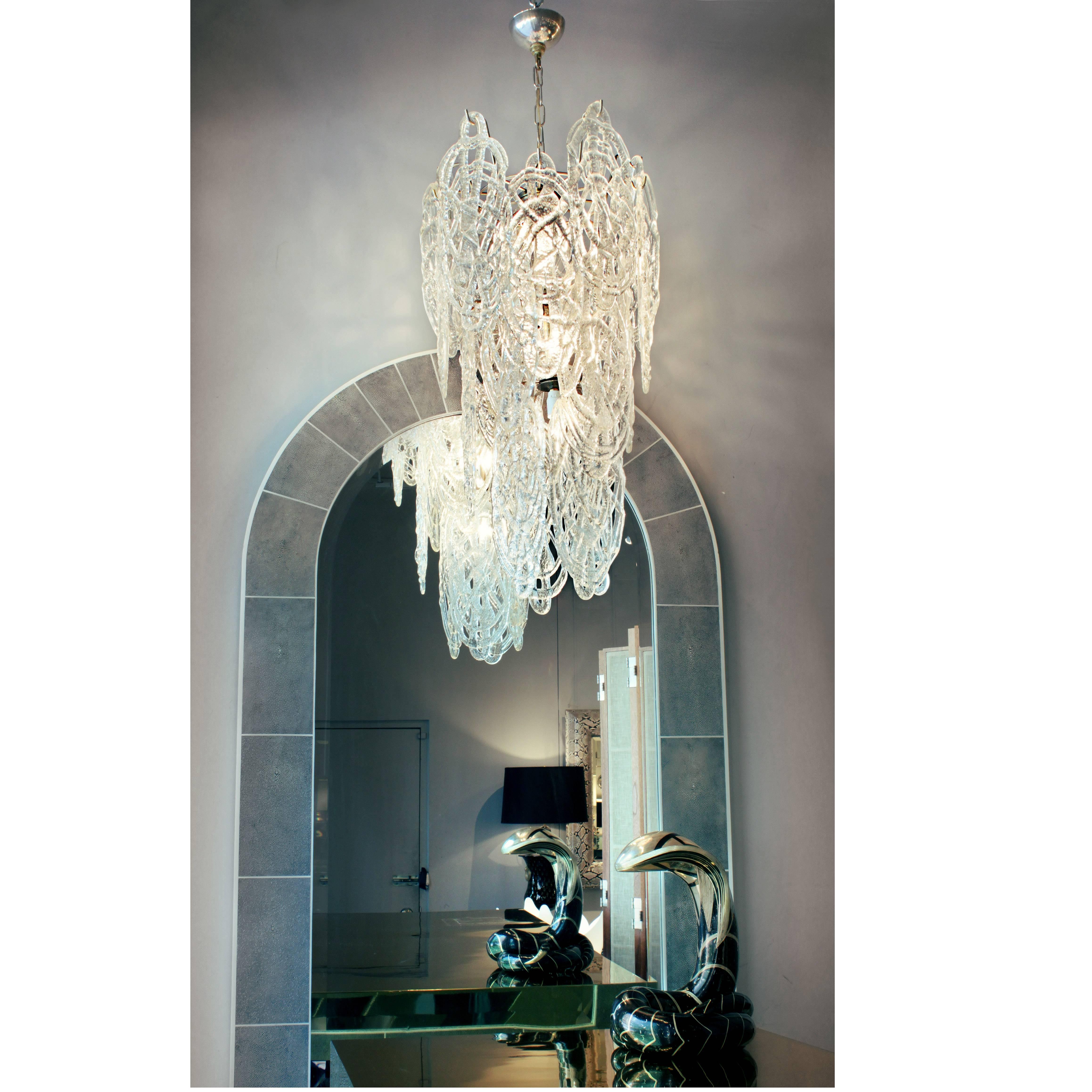Chandelier with drizzled glass over a metal frame by Mazzega, Murano Italy, 1970s.
31 inch height is without chain and canopy. It's for the glass portion only.
   
