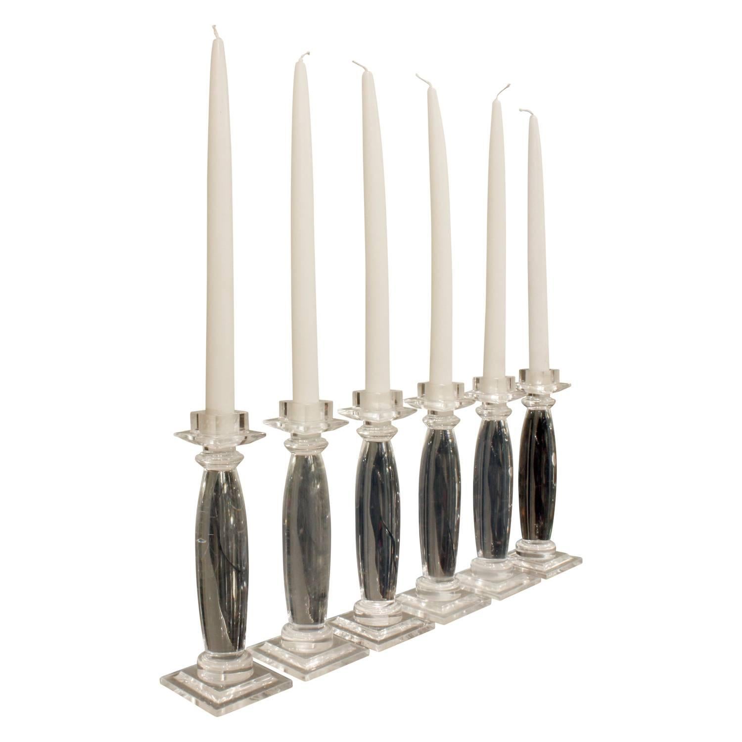 Set of six “Greek column candle holders” in solid Lucite by Karl Springer, American, 1981.