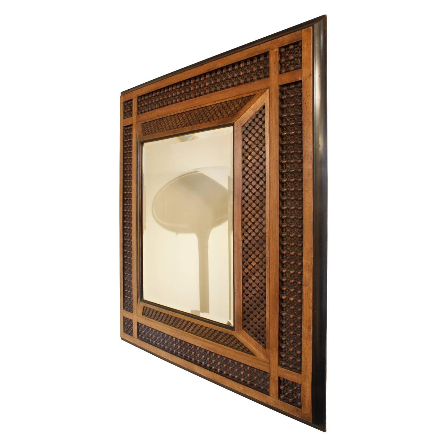 Beautifully hand-carved wood frame with intricate design and raised mirror, Morocco, 1950s.