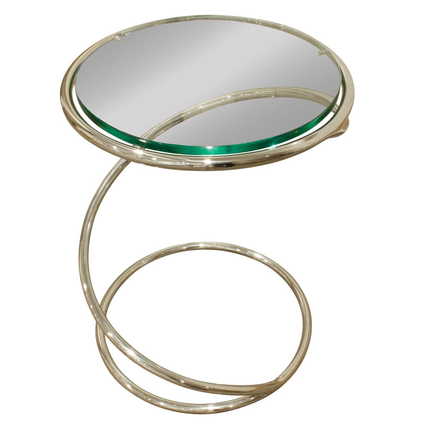 Coiled occasional table in polished chrome with glass top by Pace, American, 1970s.